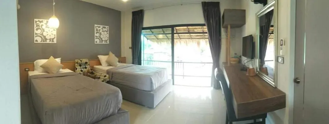 Bed in Suwi Coco Ville Resort