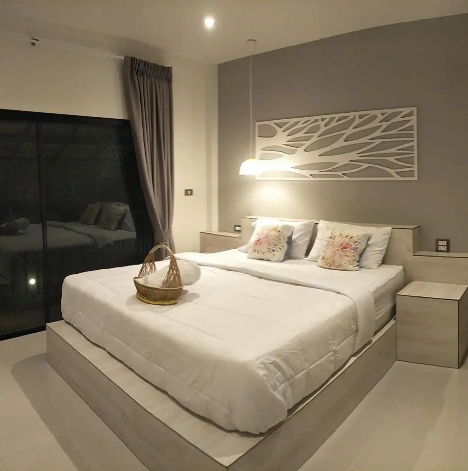 Bed in Suwi Coco Ville Resort