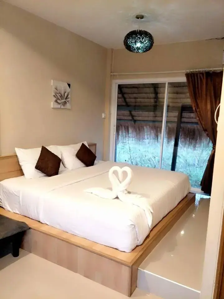 Bed in Suwi Coco Ville Resort Bed in Suwi Coco Ville Resort