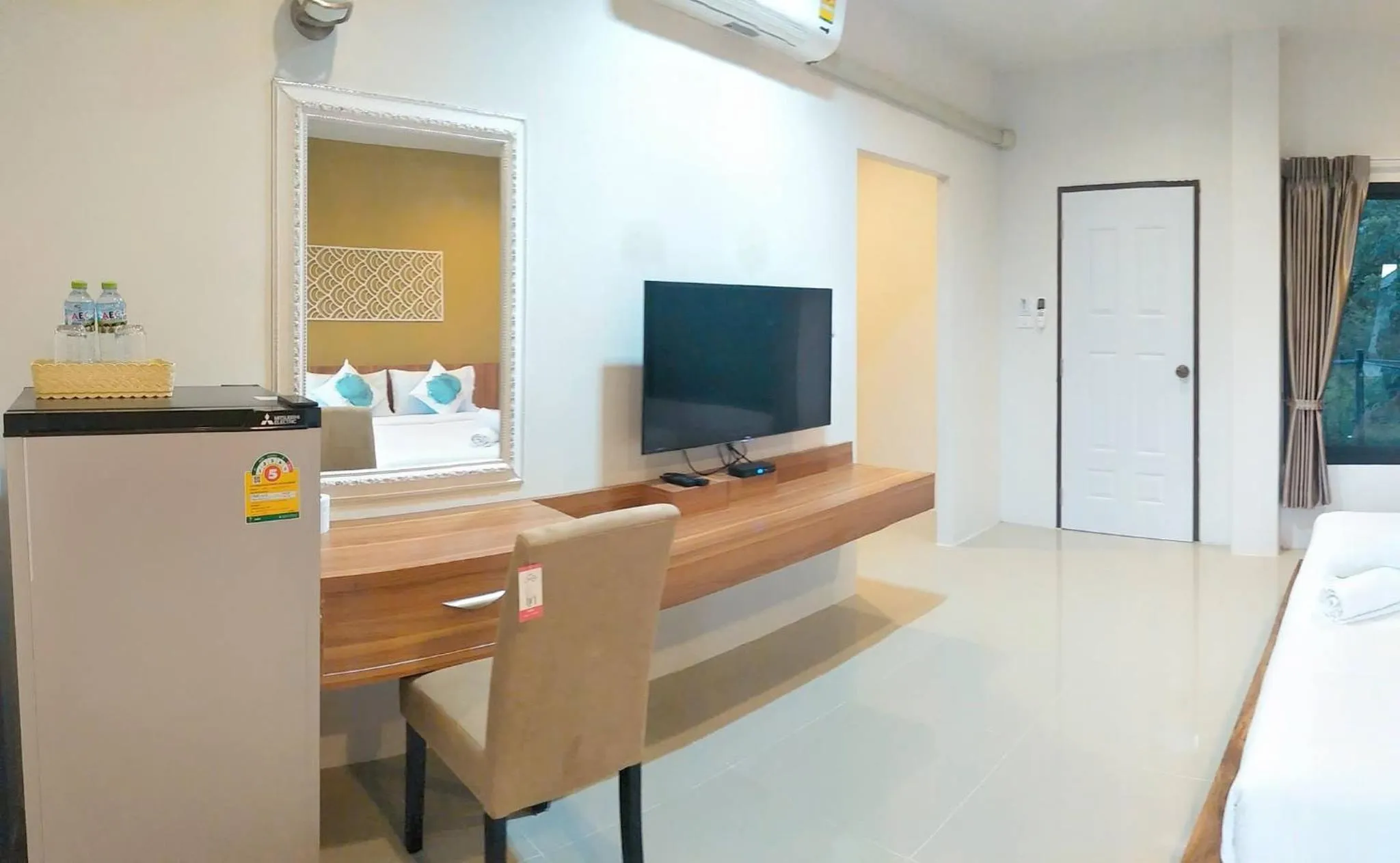 Bed in Suwi Coco Ville Resort