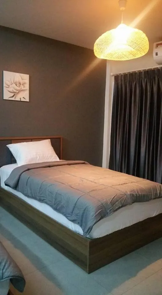 Bed in Suwi Coco Ville Resort