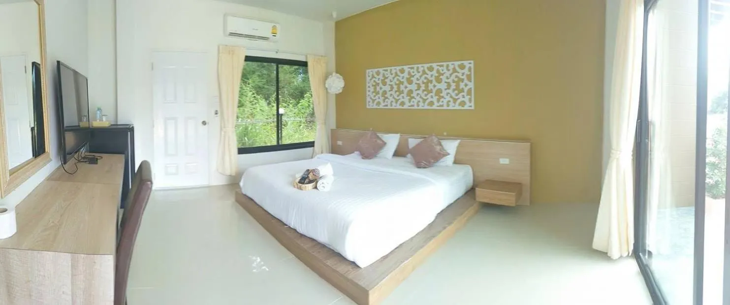 Bed in Suwi Coco Ville Resort