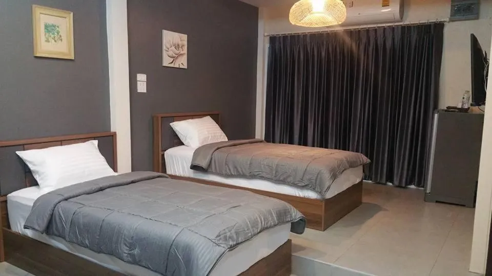 Bed in Suwi Coco Ville Resort