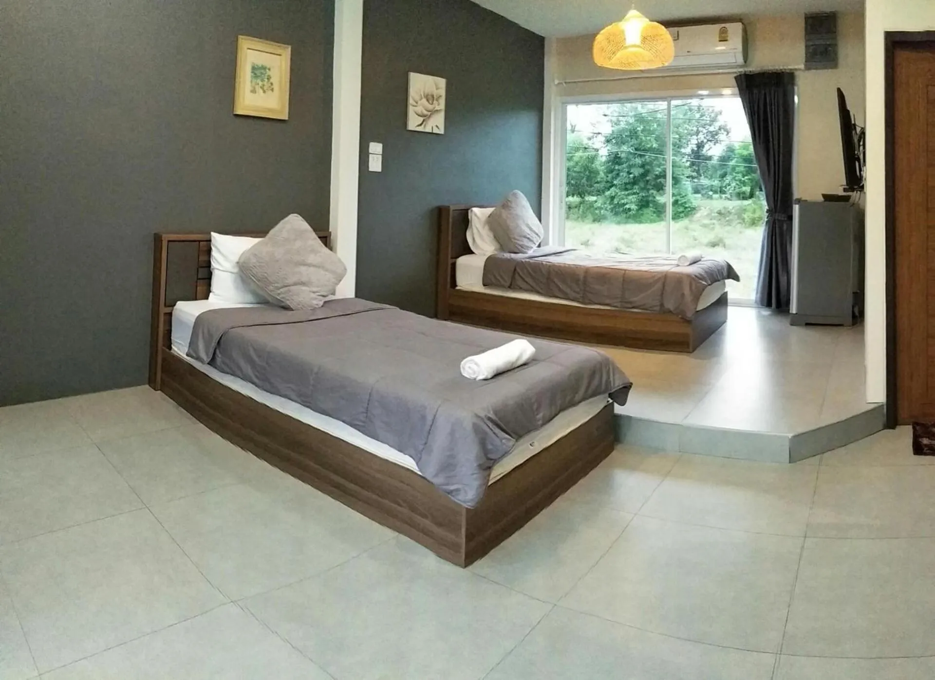 Bed in Suwi Coco Ville Resort