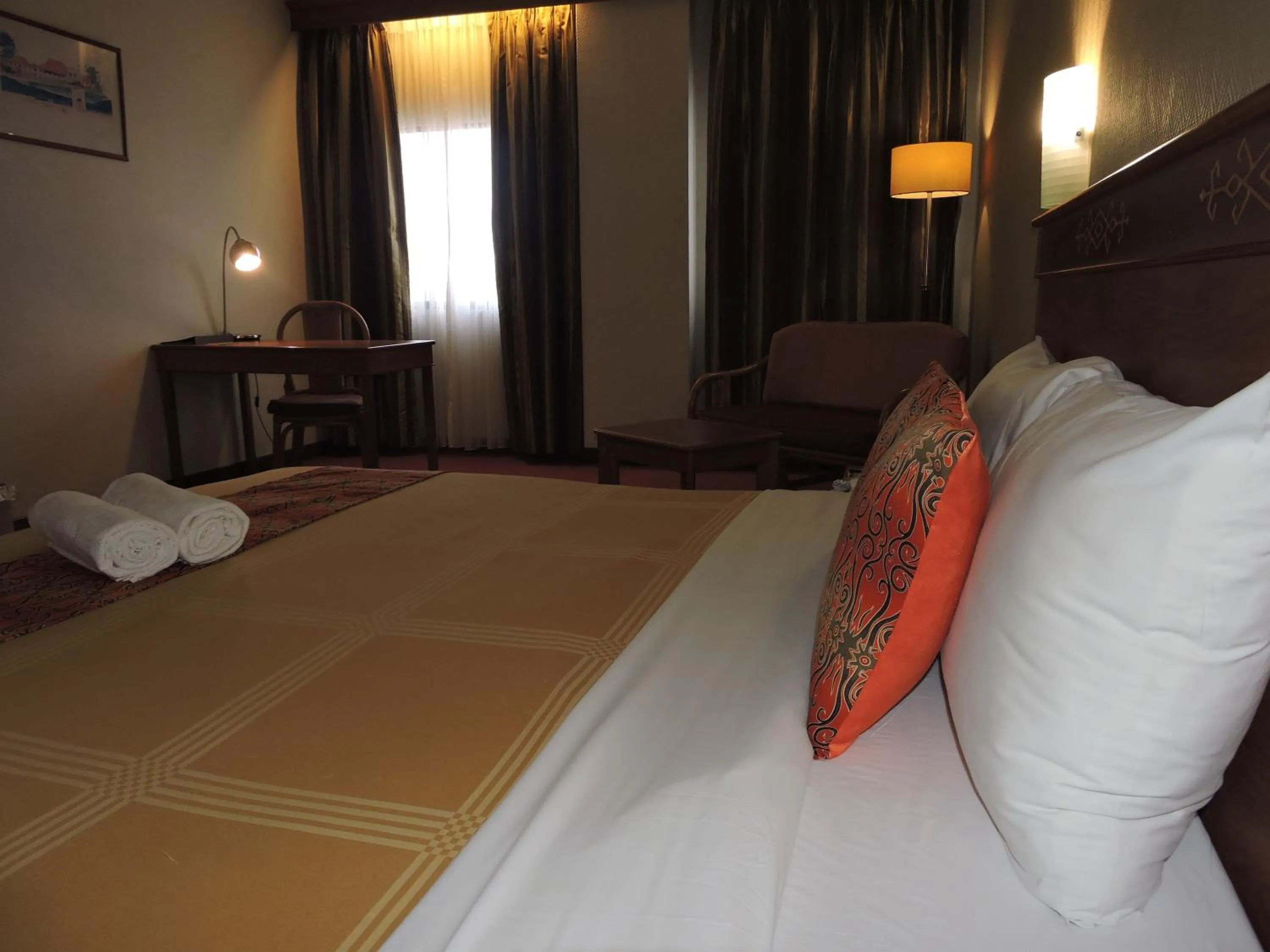 Photo of the whole room, Bed in Hotel Grand Continental Kuching