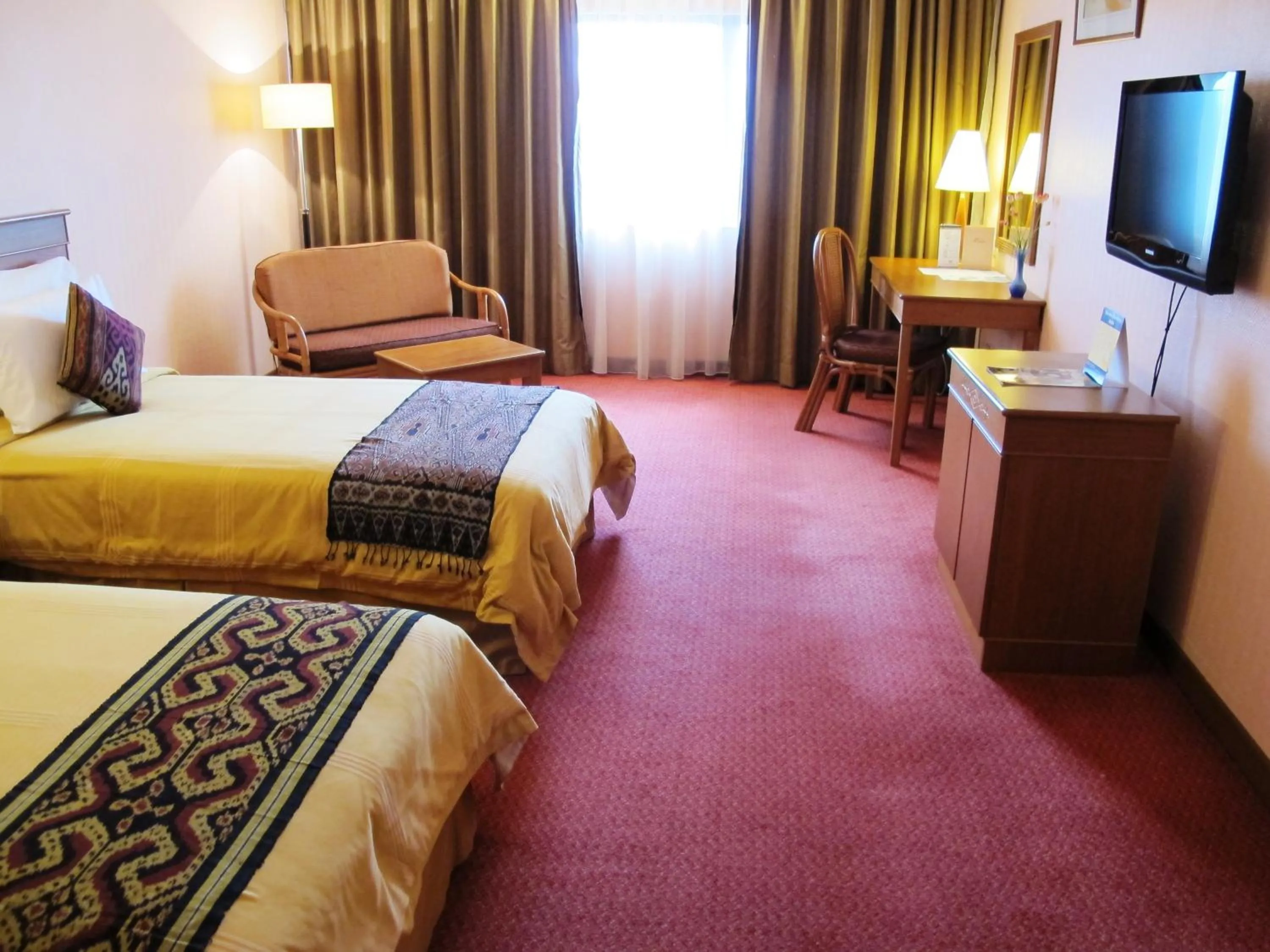 Photo of the whole room, Bed in Hotel Grand Continental Kuching