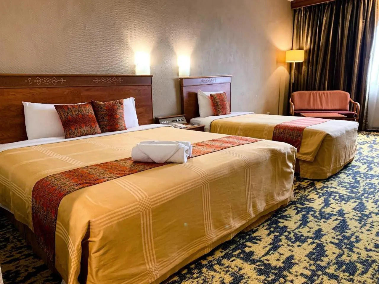 Photo of the whole room, Bed in Hotel Grand Continental Kuching