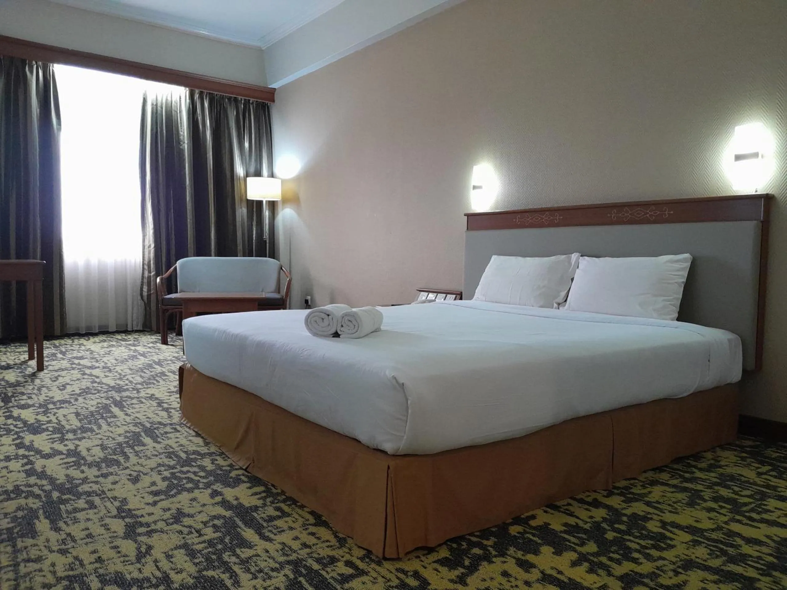 Bed in Hotel Grand Continental Kuching