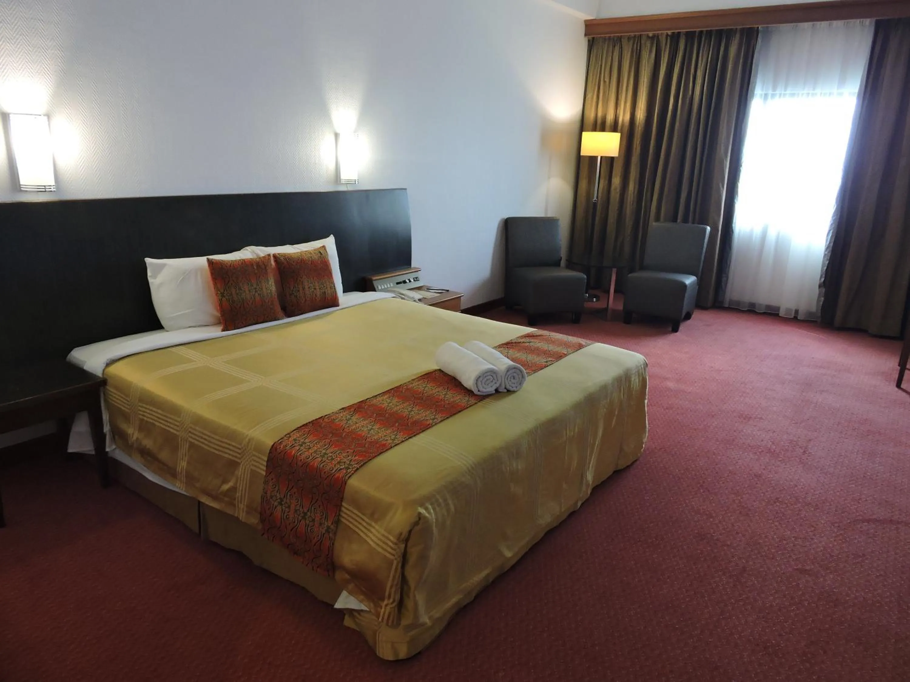 Photo of the whole room, Bed in Hotel Grand Continental Kuching