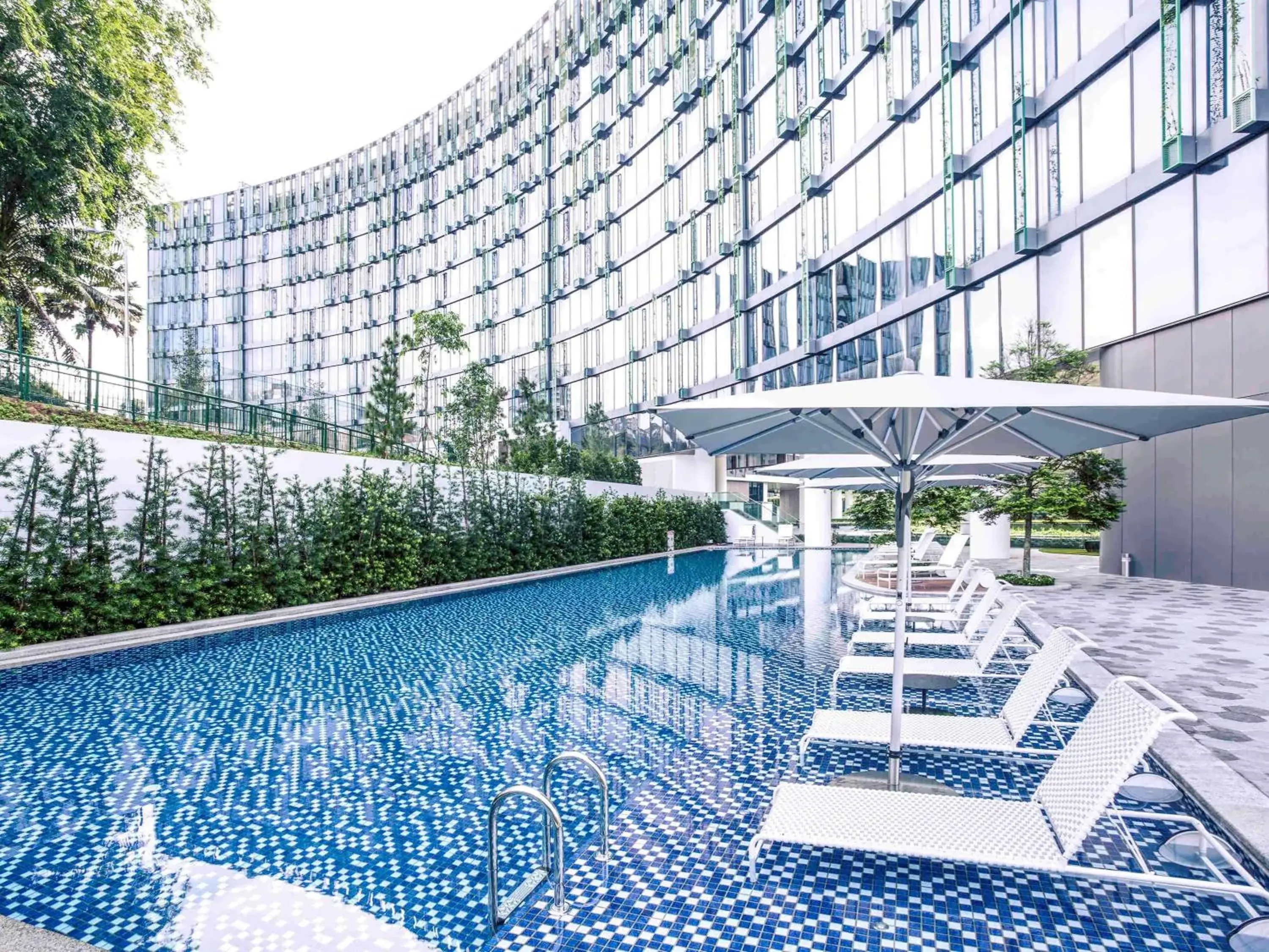Pool view in Mercure Singapore On Stevens Pool view in Mercure Singapore On Stevens