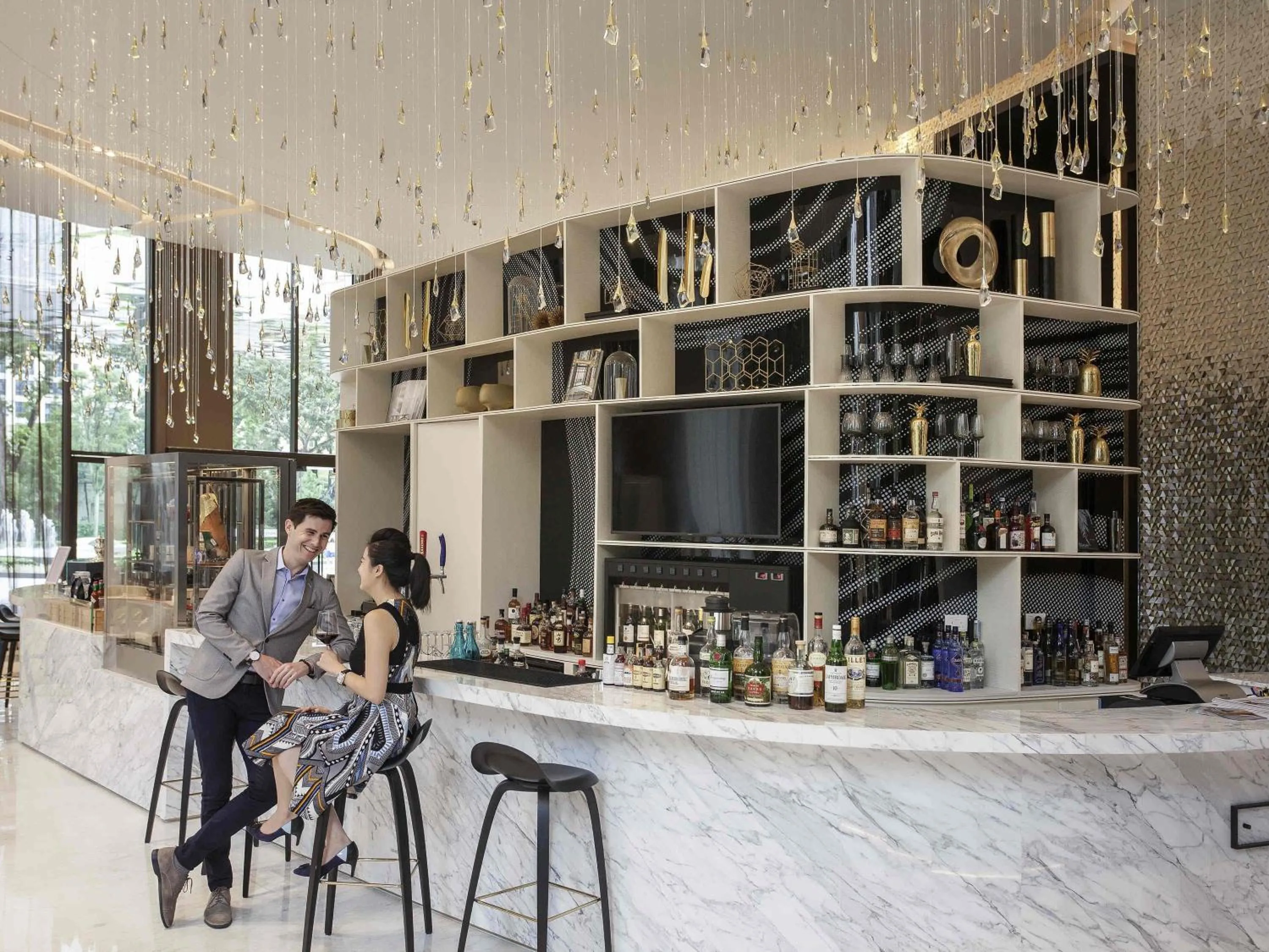 Lounge or bar in Novotel Singapore On Stevens