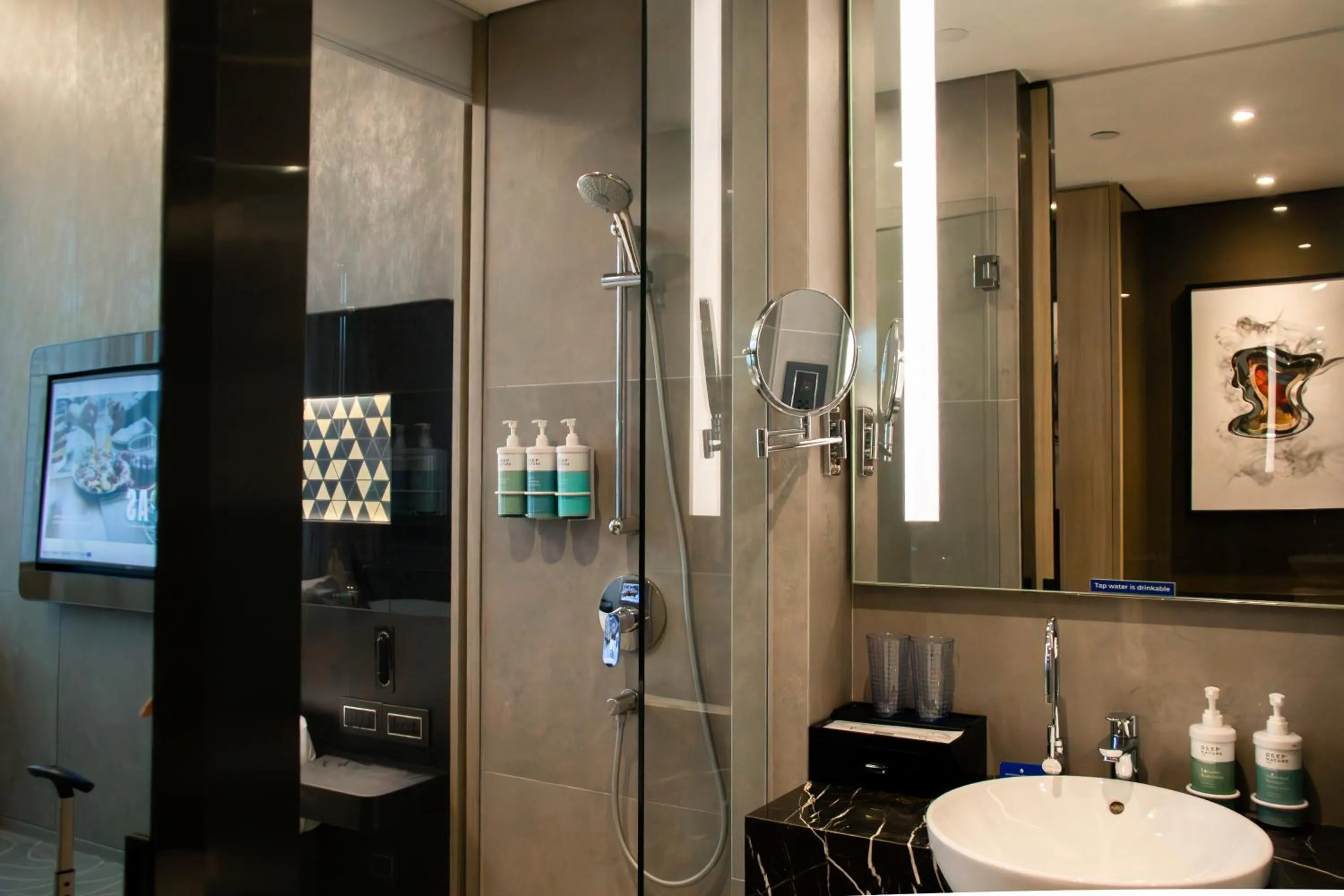 Bathroom in Novotel Singapore On Stevens