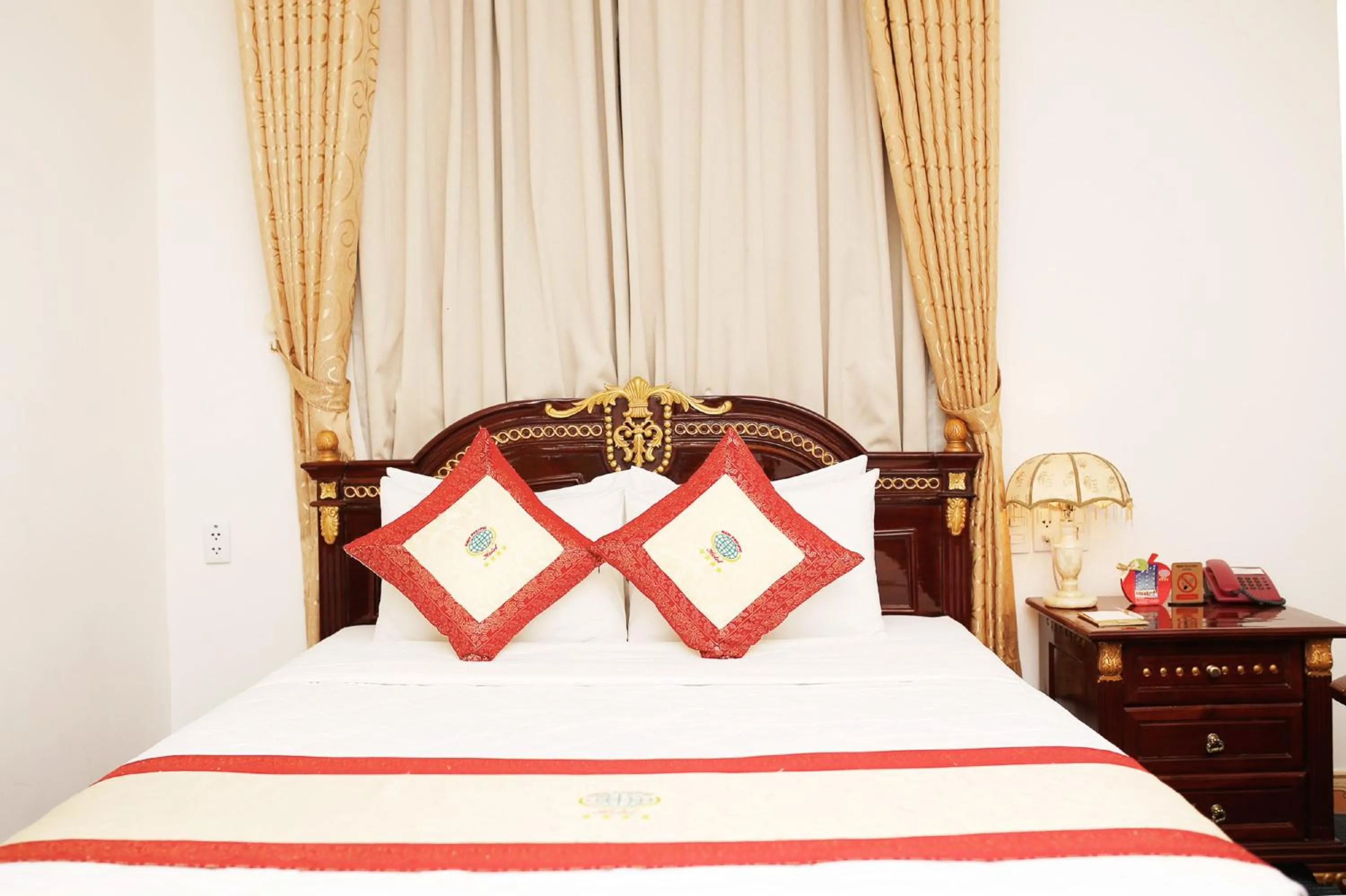 Bed in New Pacific Hotel