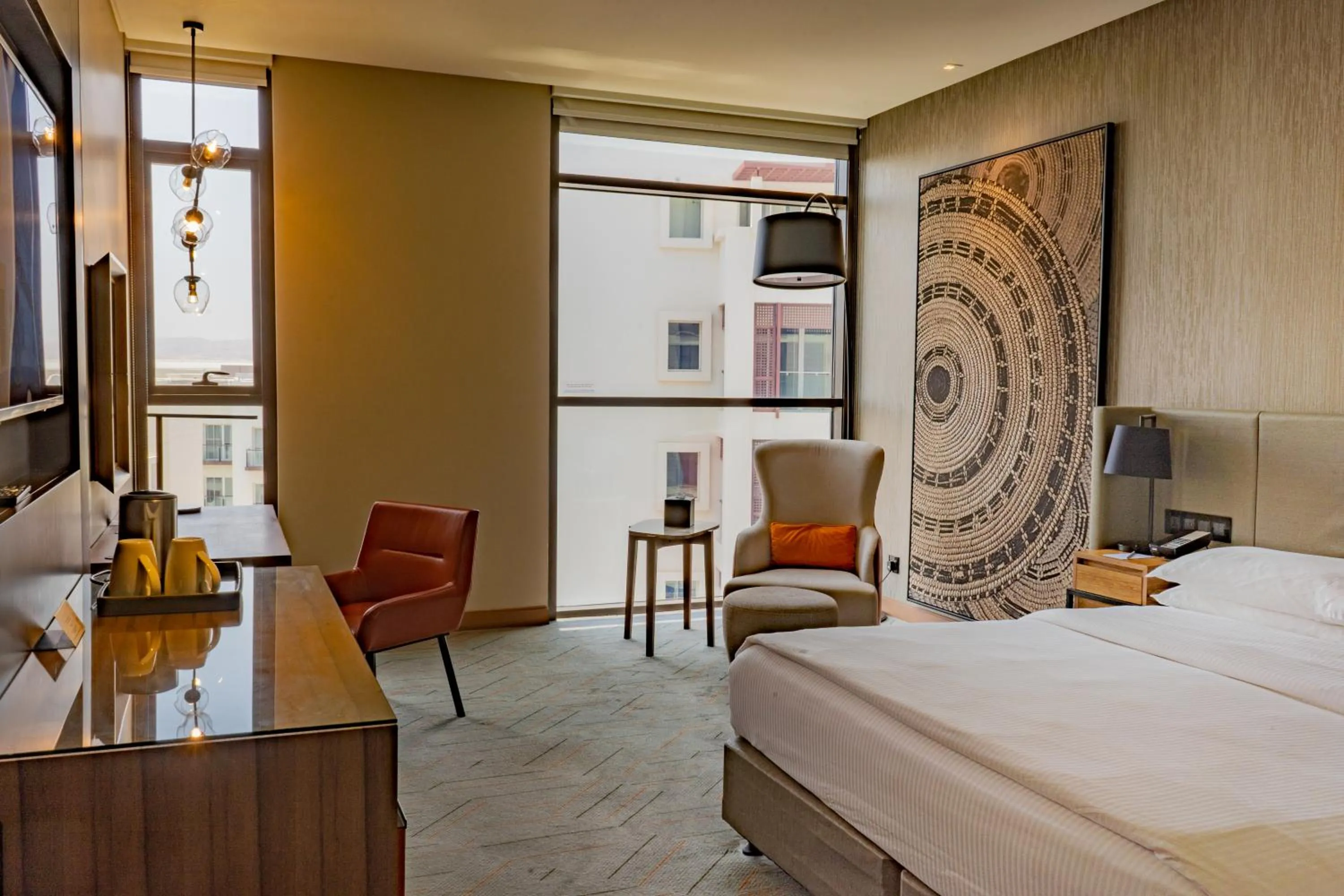 Bed in Mysk Al Mouj Hotel