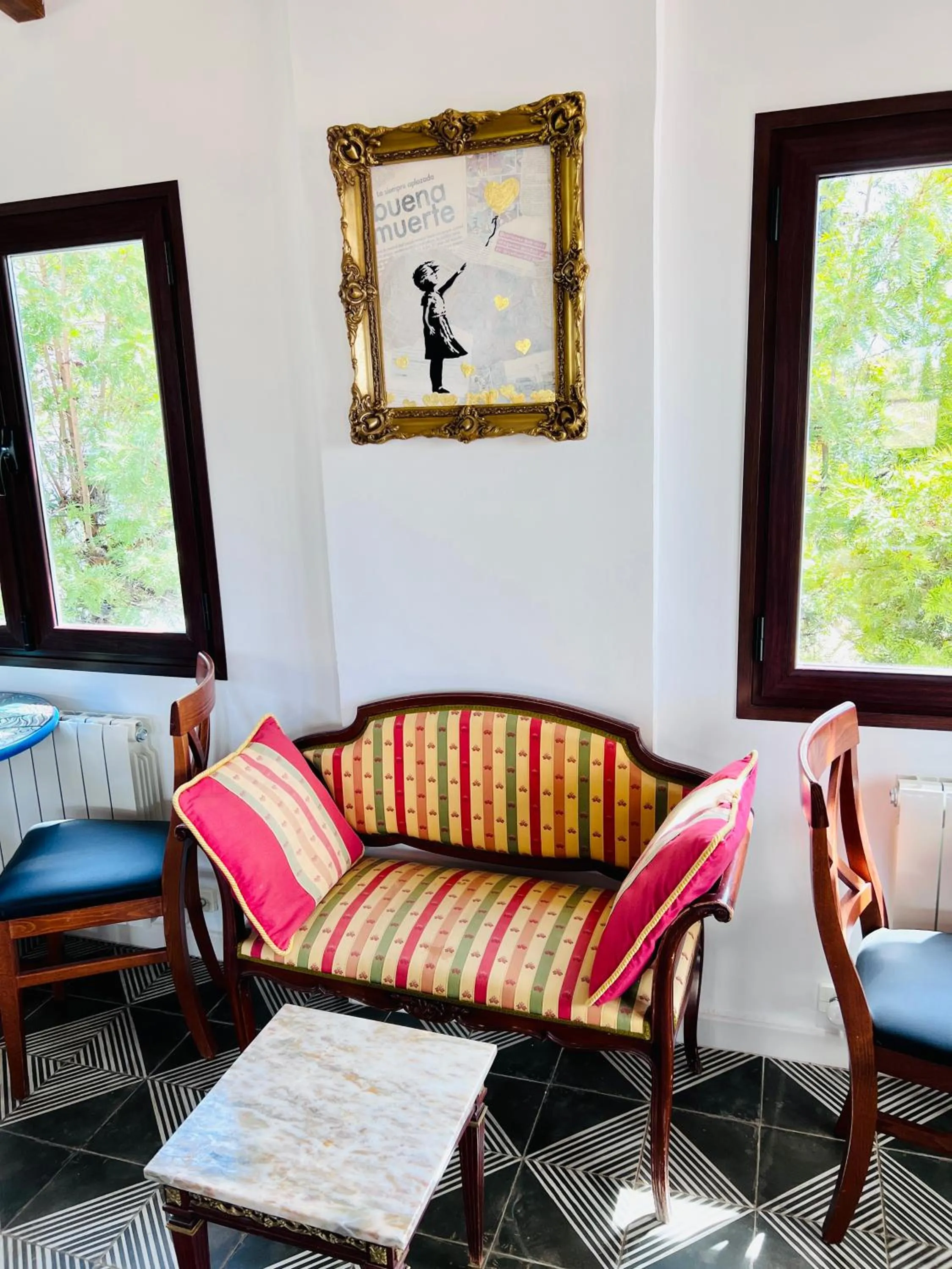 Communal lounge/ TV room in Hotelito Suecia