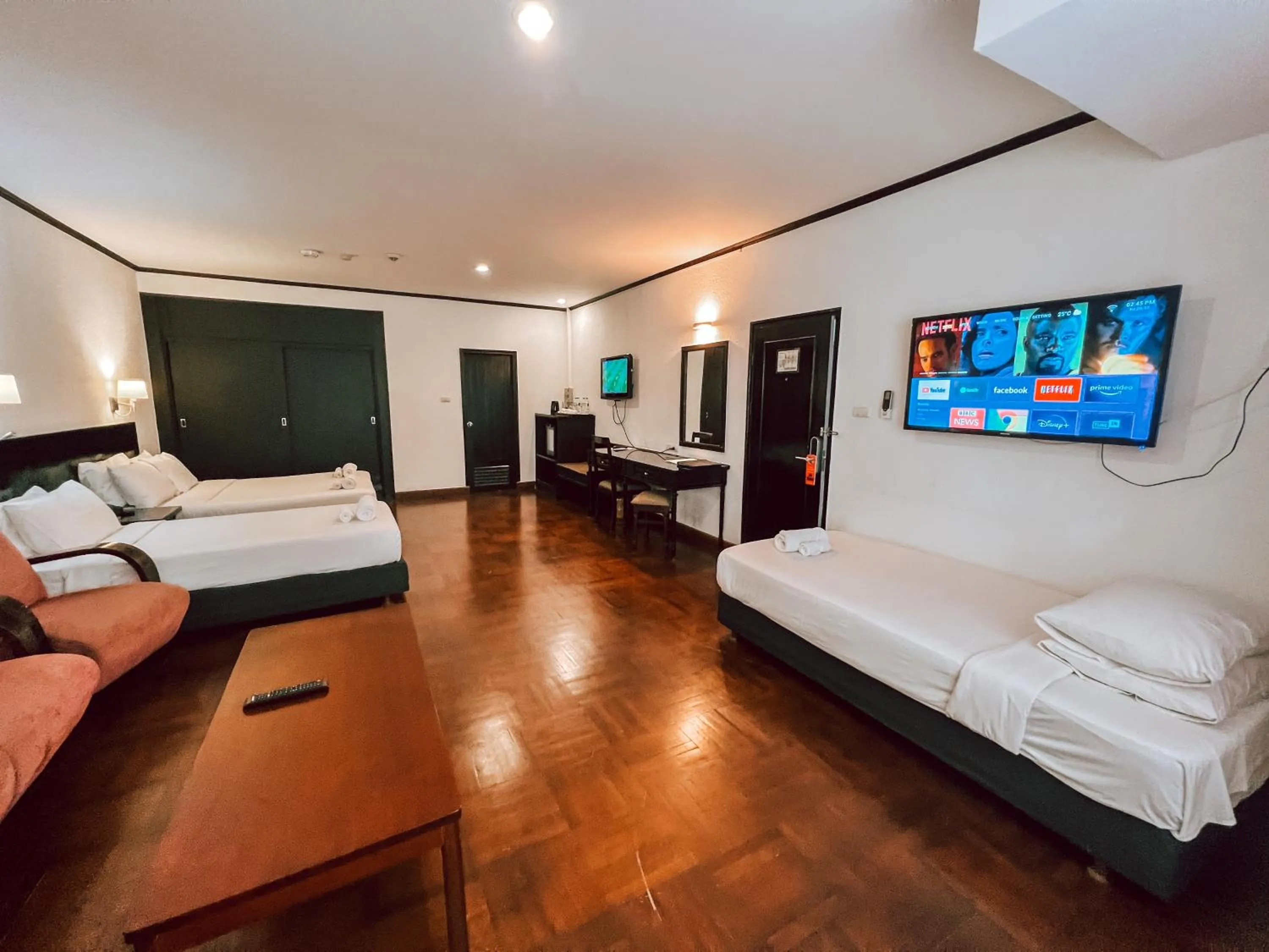 Bed in Le Charme Vientiane Hotel