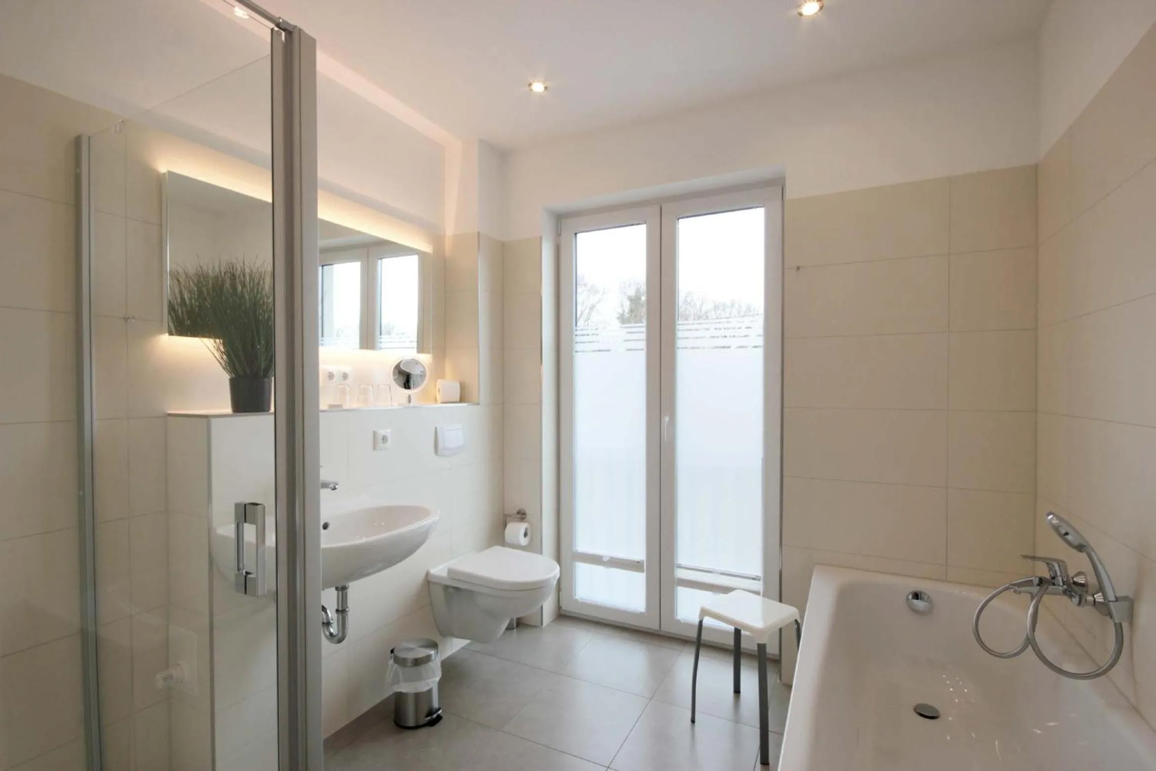 Bathroom in Villa Südstrandperle by Rujana