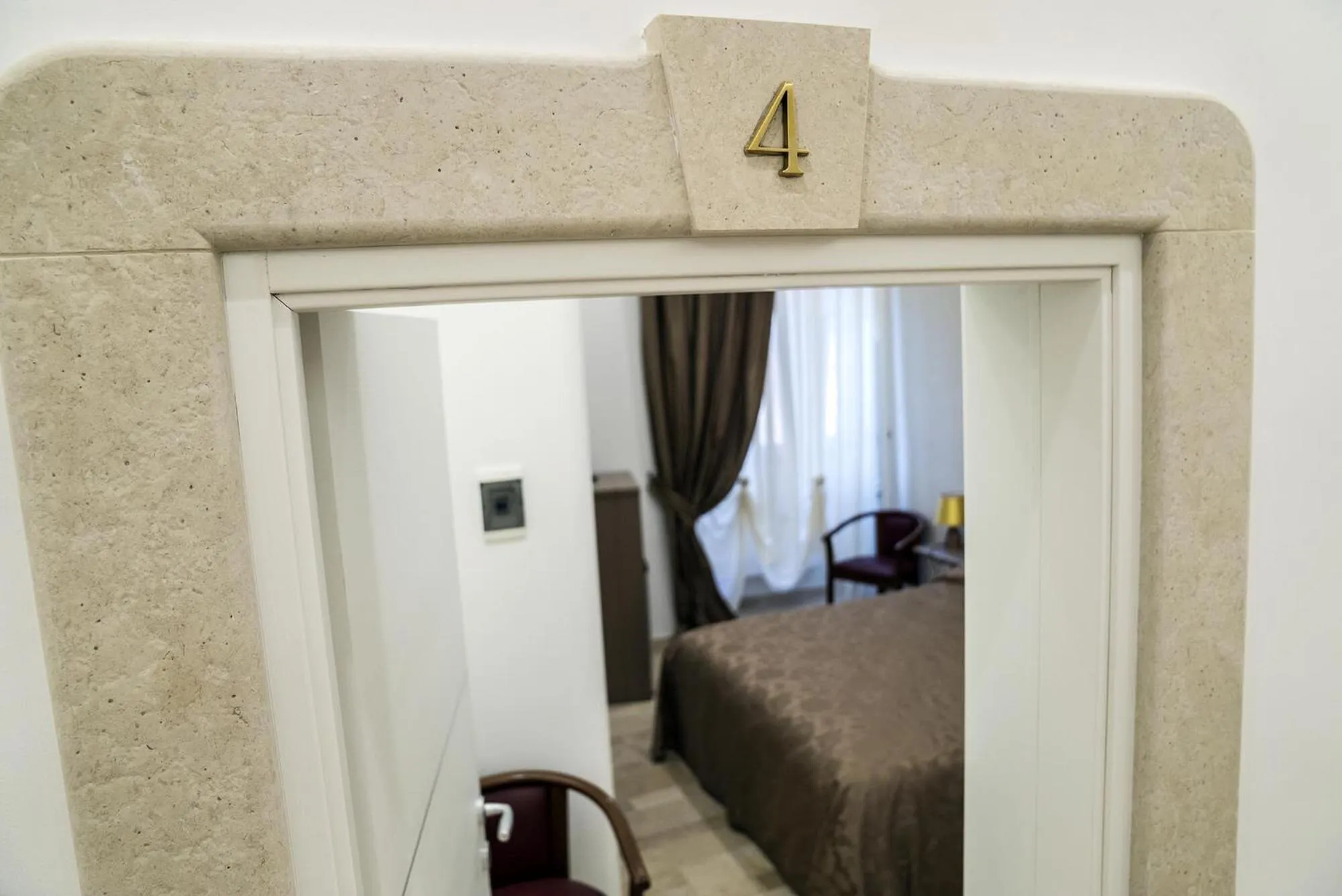 Decorative detail, Bed in B&B Conte Cavour