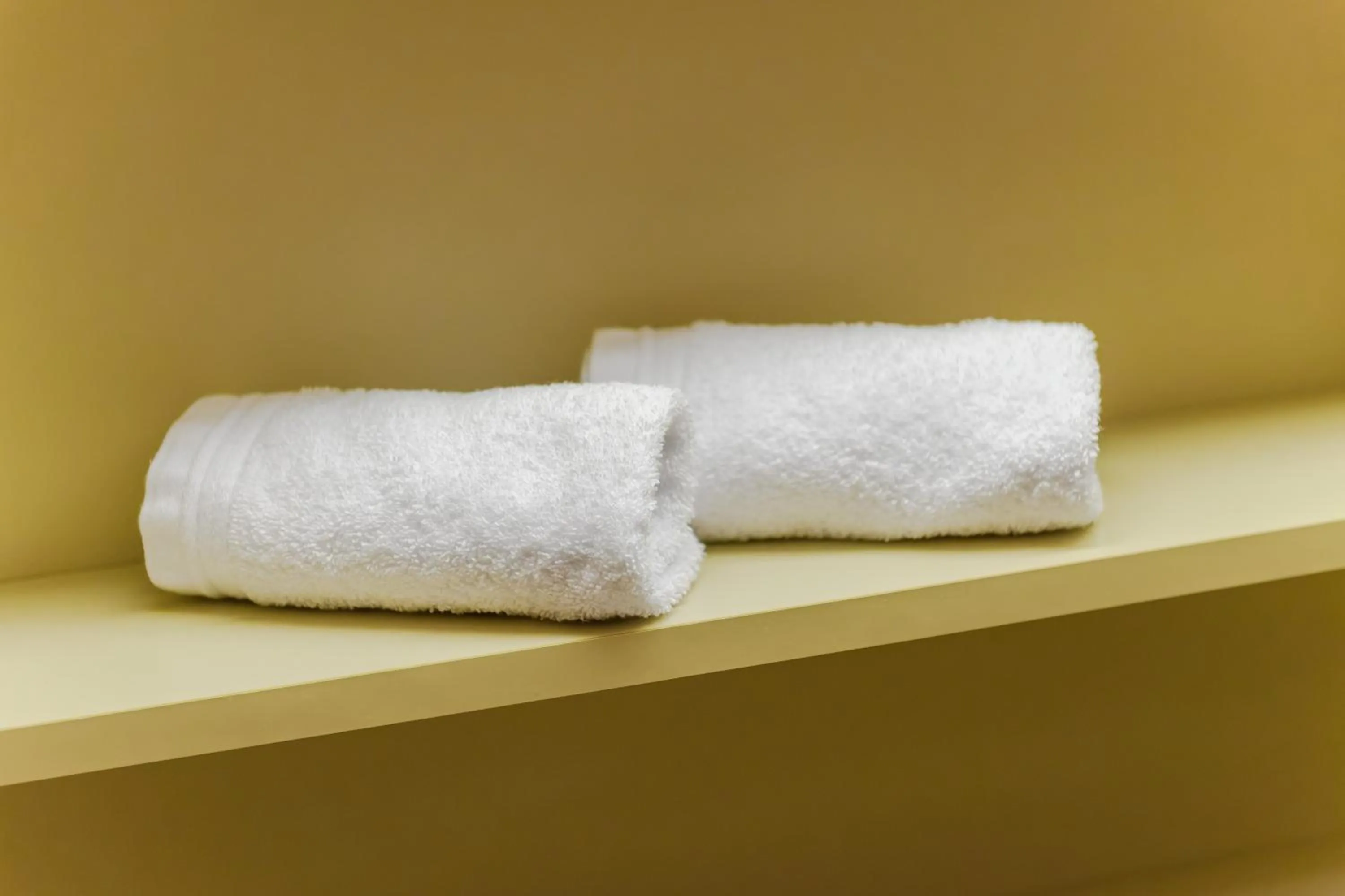 towels, Bed in Poschiavo Suisse Hotel