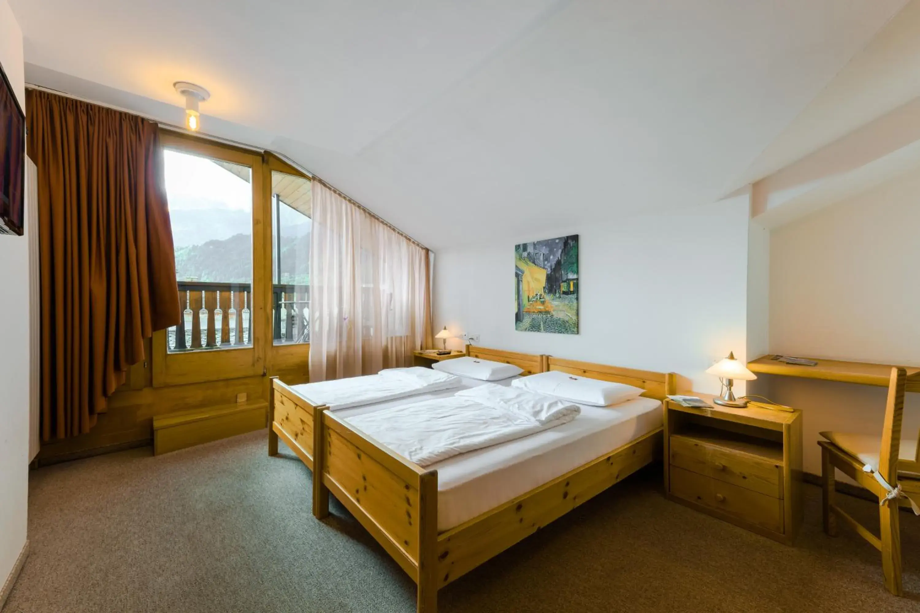 Twin Room with Balcony in Poschiavo Suisse Hotel Twin Room with Balcony in Poschiavo Suisse Hotel