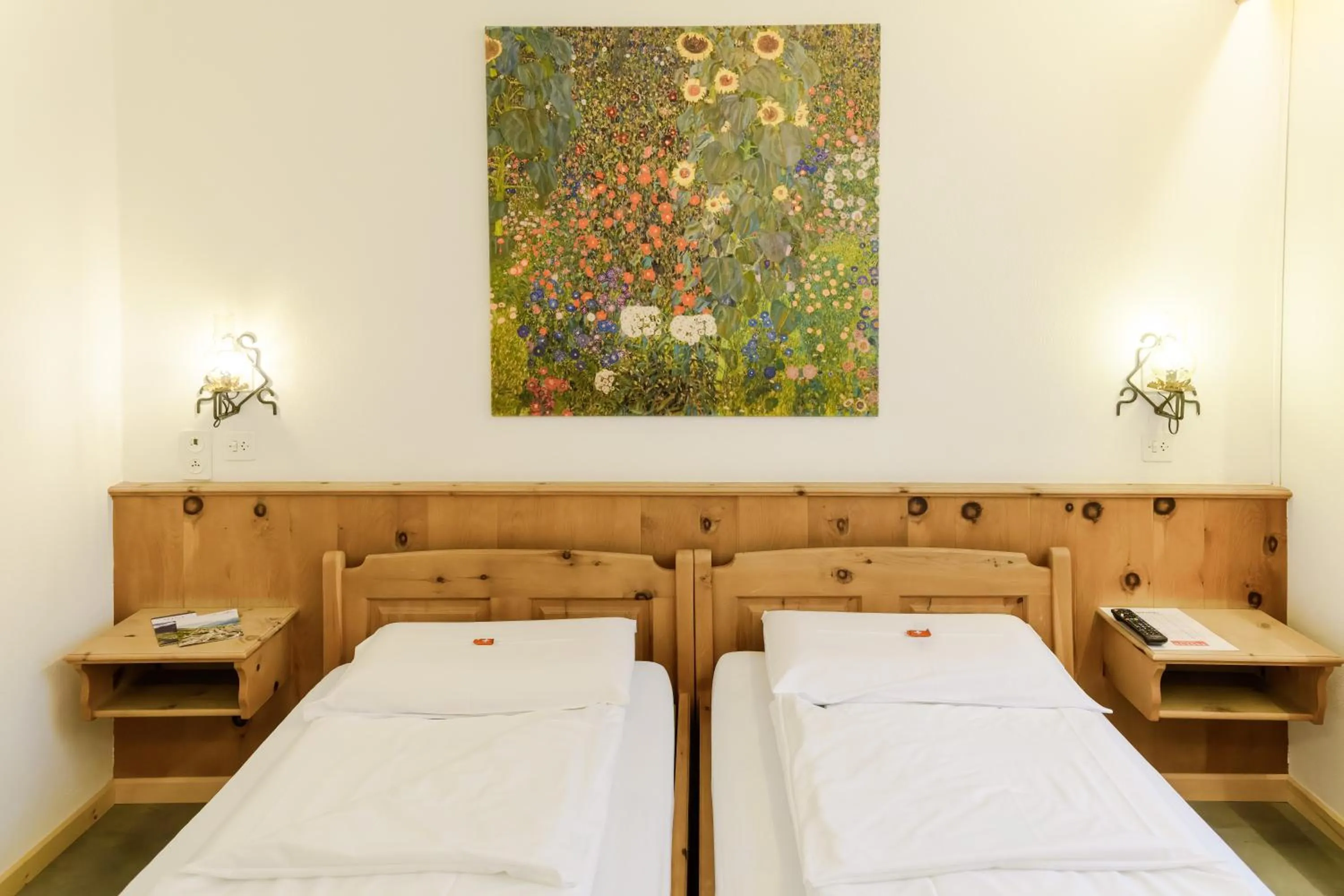 Bed in Poschiavo Suisse Hotel