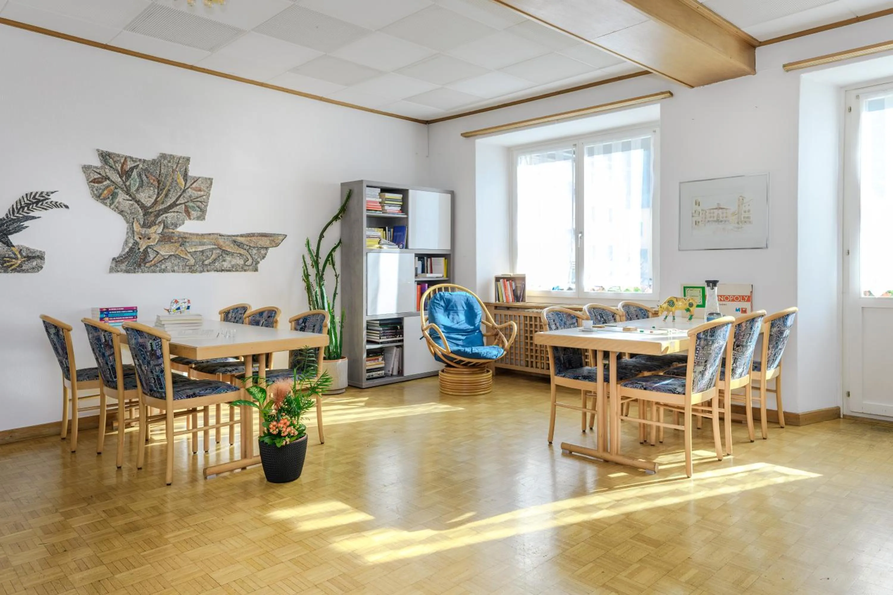 Communal lounge/ TV room in Poschiavo Suisse Hotel