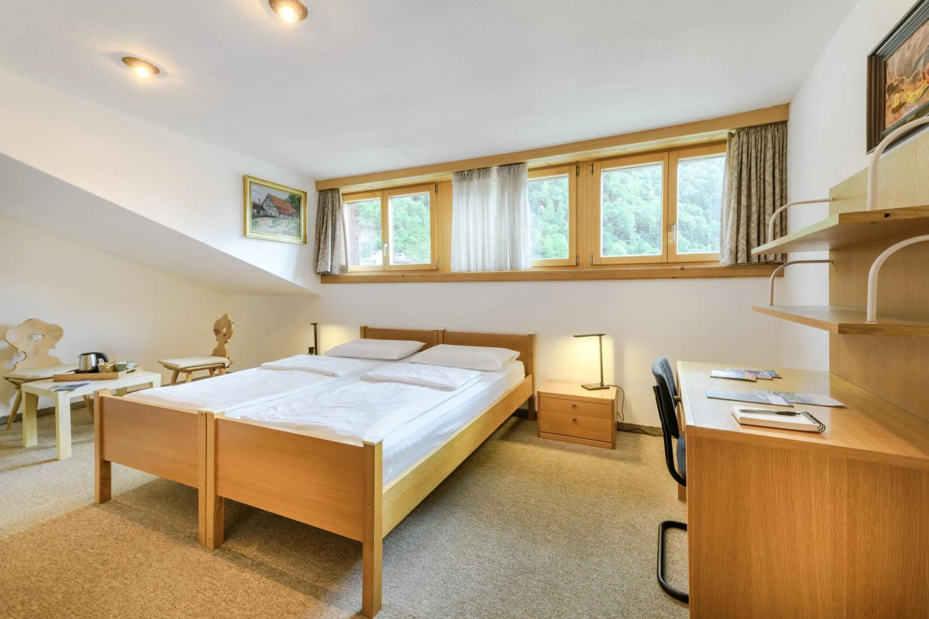 Bed in Poschiavo Suisse Hotel