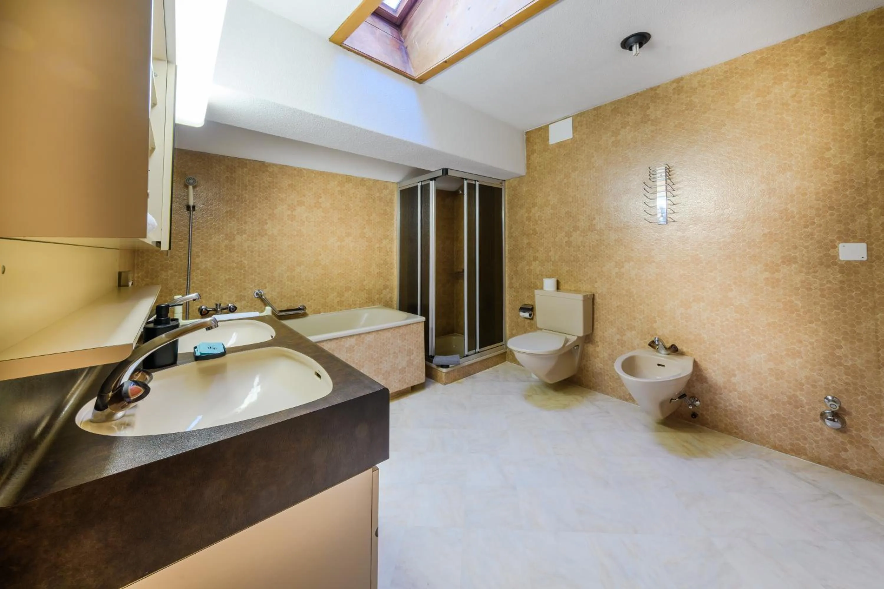 Toilet, Bed in Poschiavo Suisse Hotel