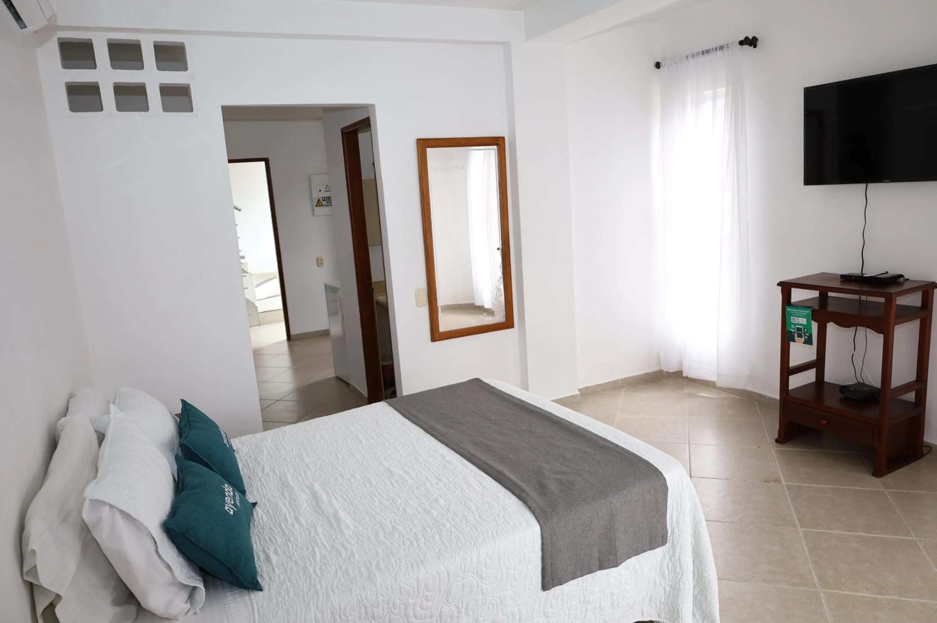 Communal lounge/ TV room in Hotel Nattivo Uraba