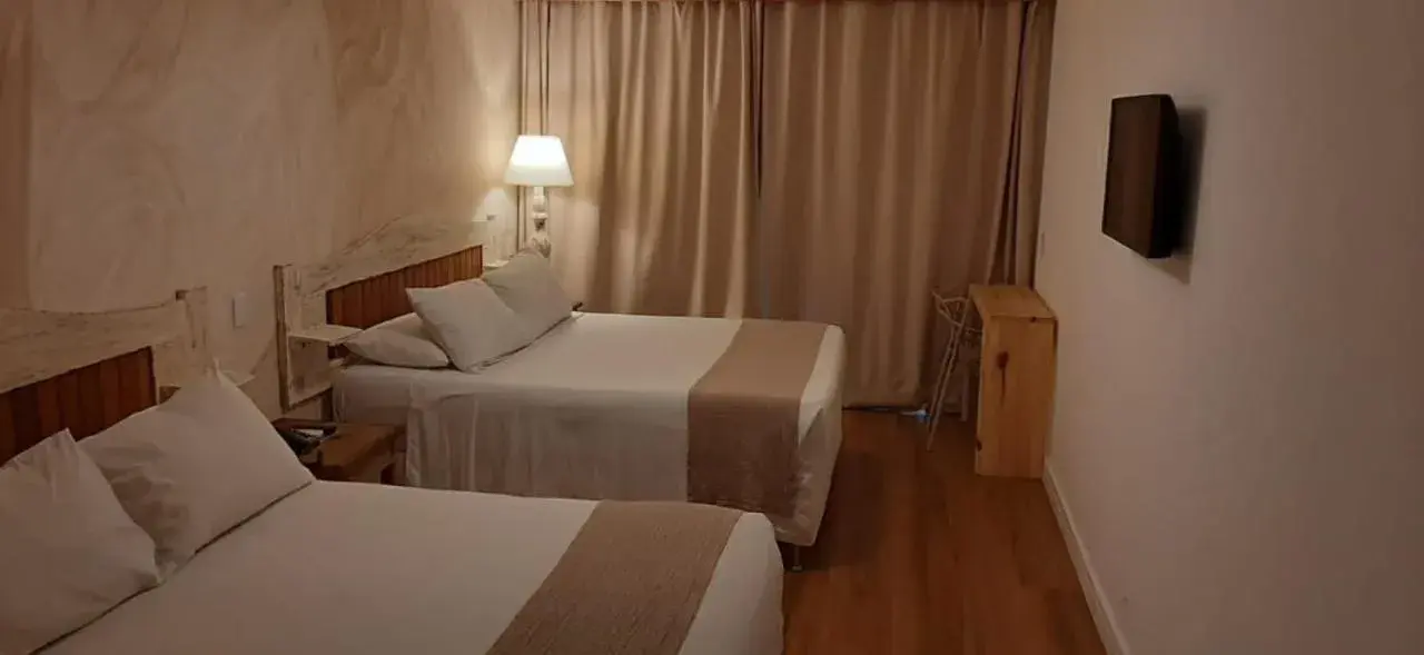 Bed in Aquarela Praia Hotel Bed in Aquarela Praia Hotel