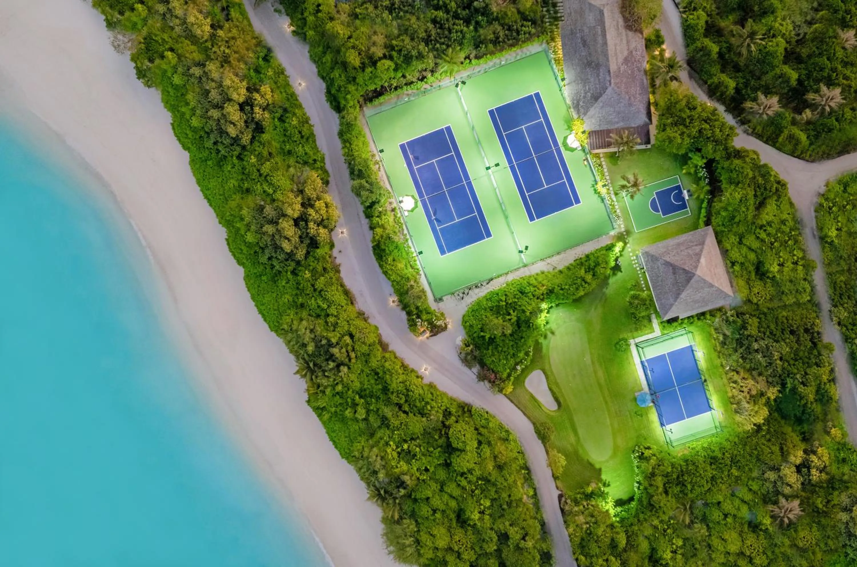 Tennis court in Hideaway Beach Resort & Spa - FREE SHARED CHARTER FLIGHT for two on stays of 7 or more nights from September 2025 until 23rd December 2026