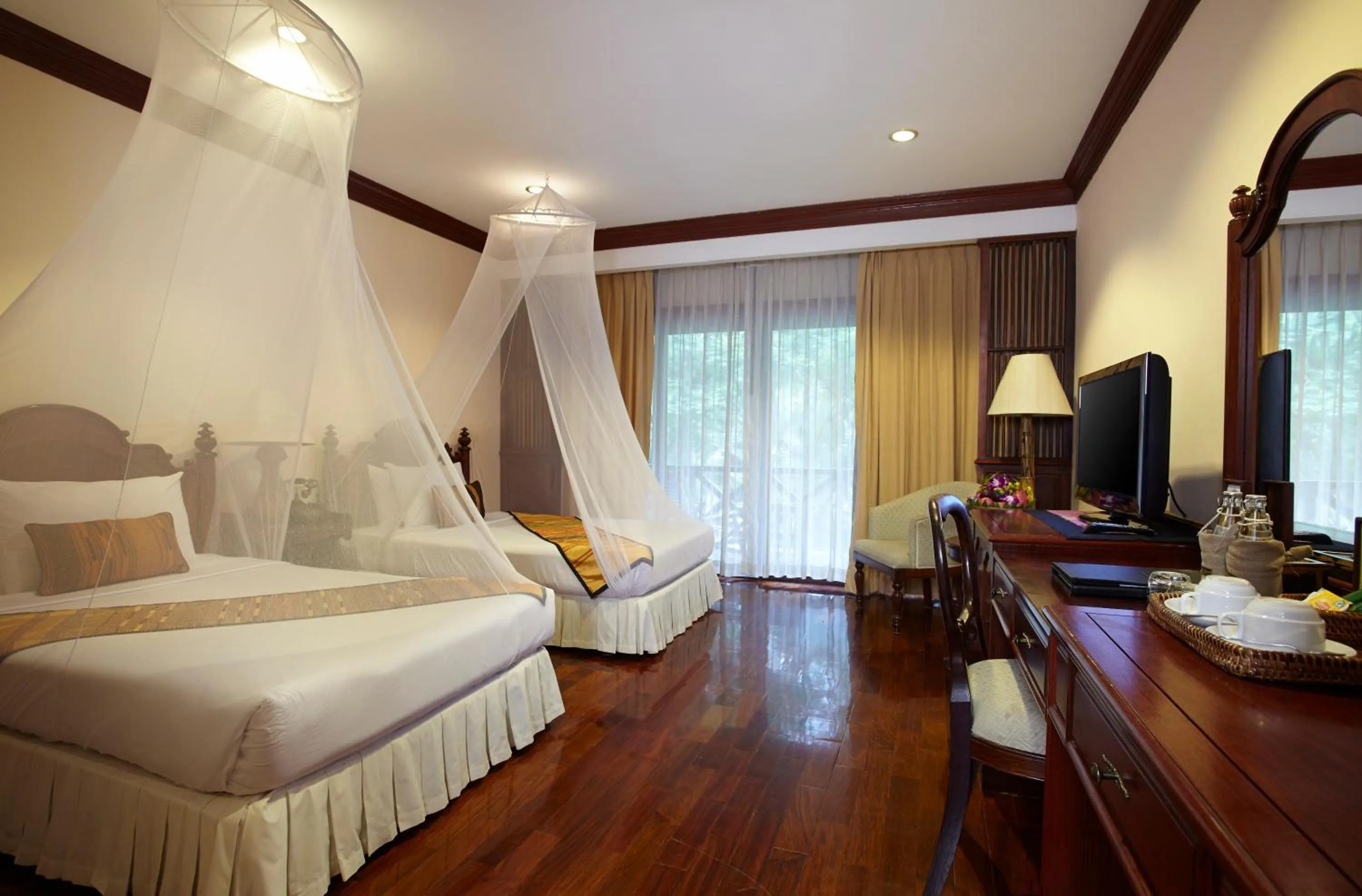 Bed in Santi Resort & Spa
