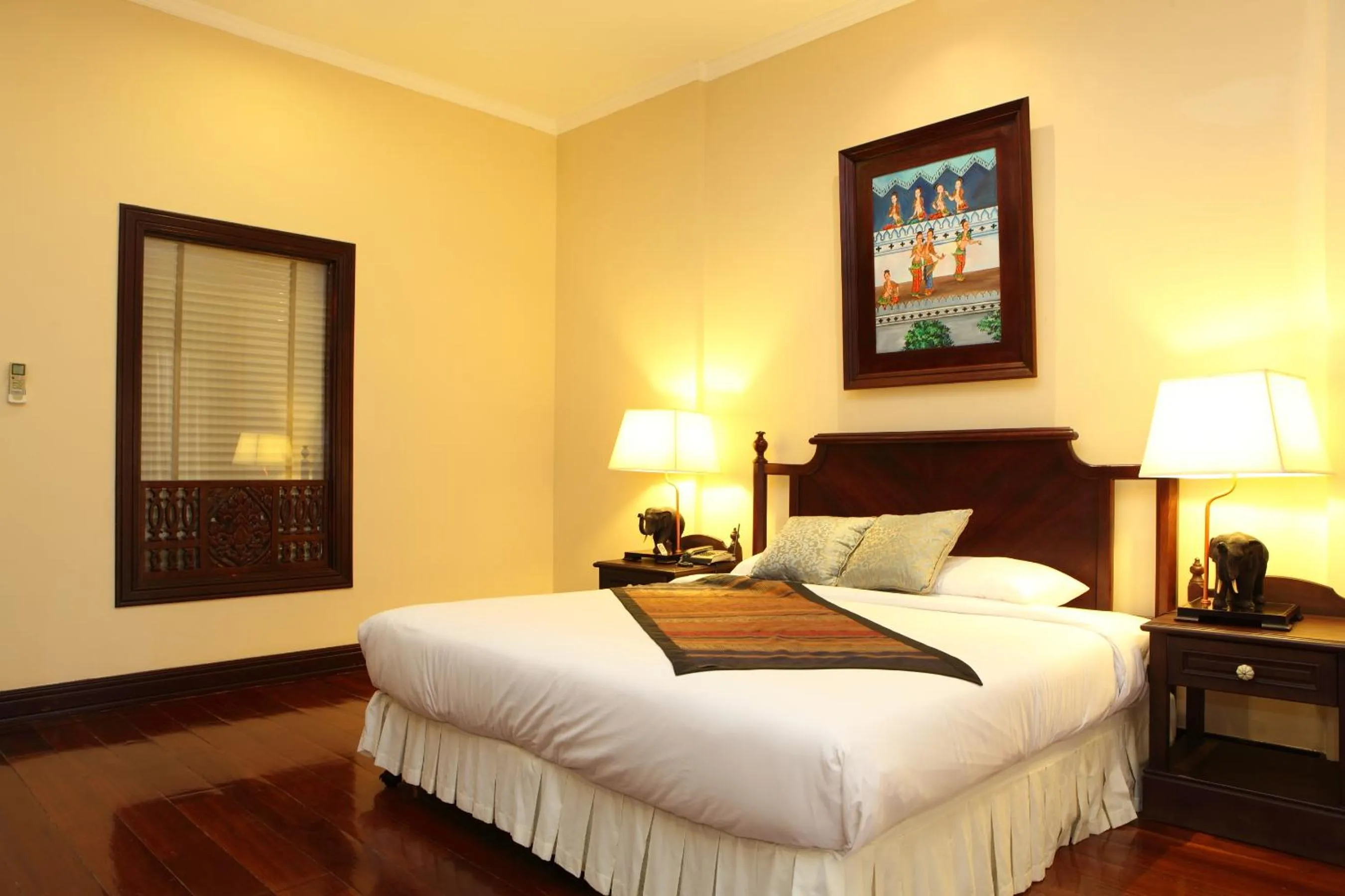 Bed in Santi Resort & Spa