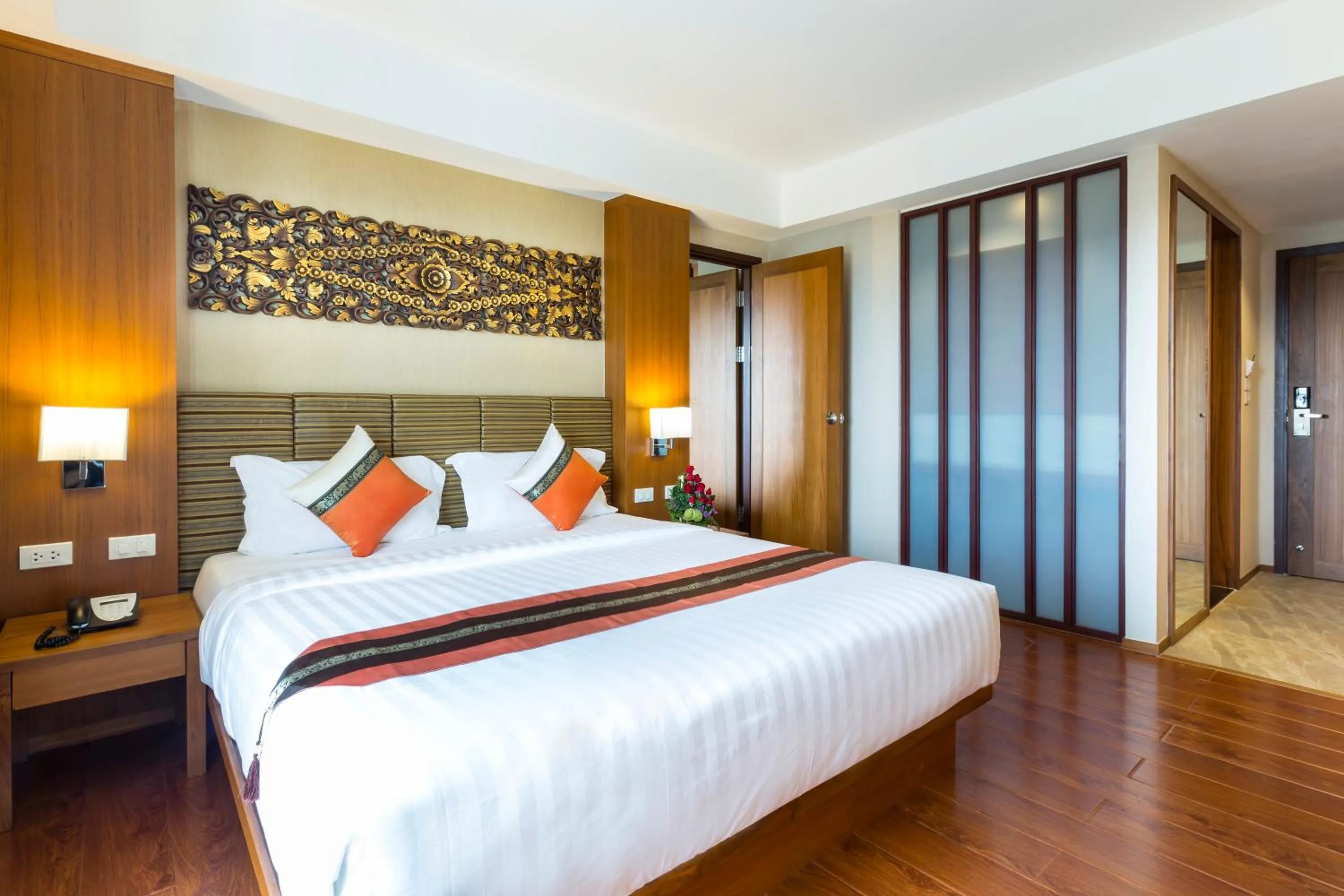 Photo of the whole room, Bed in Asia Hotels Group (Poonpetch Chiangmai)