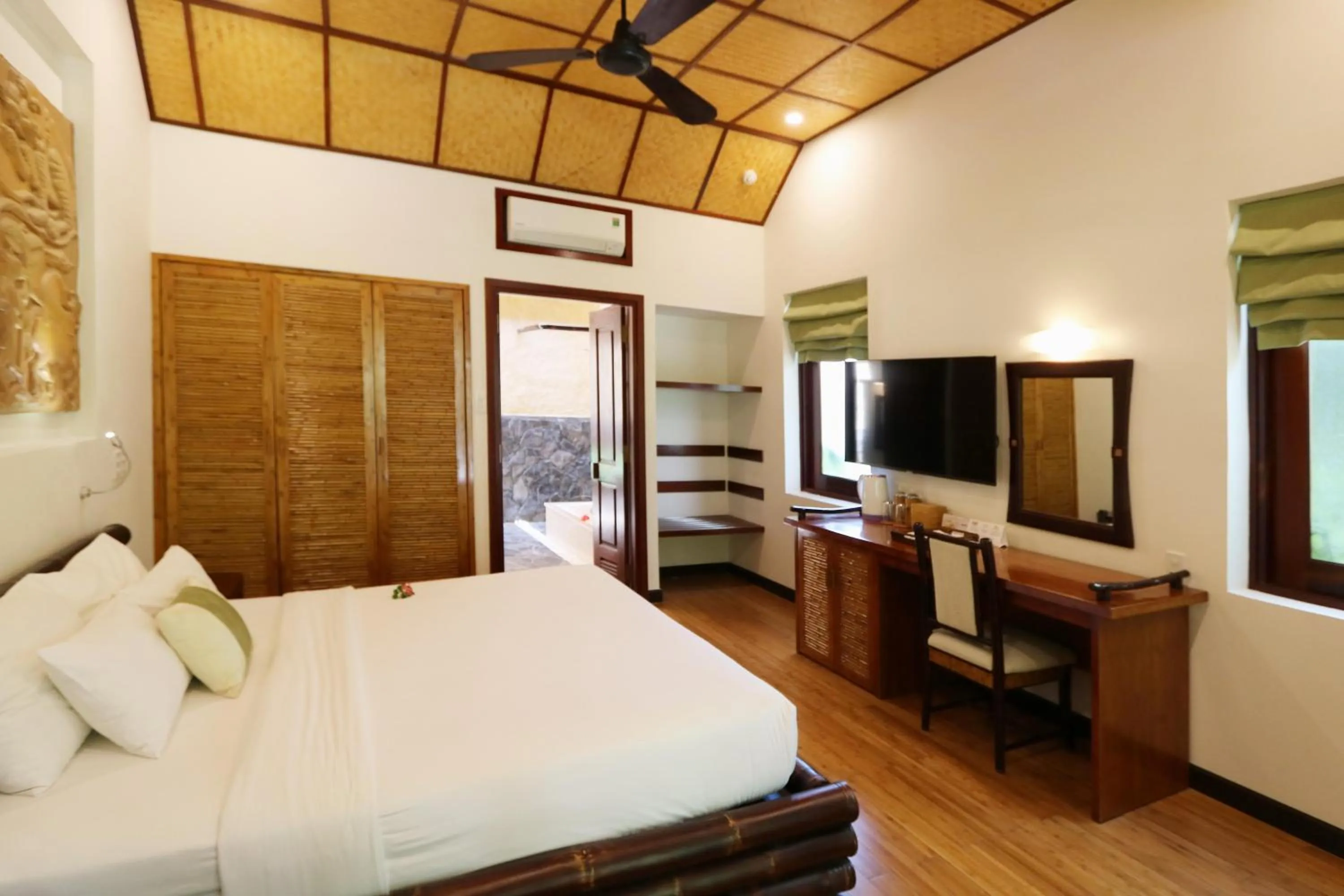 Bedroom, Bed in Bamboo Village Beach Resort & Spa