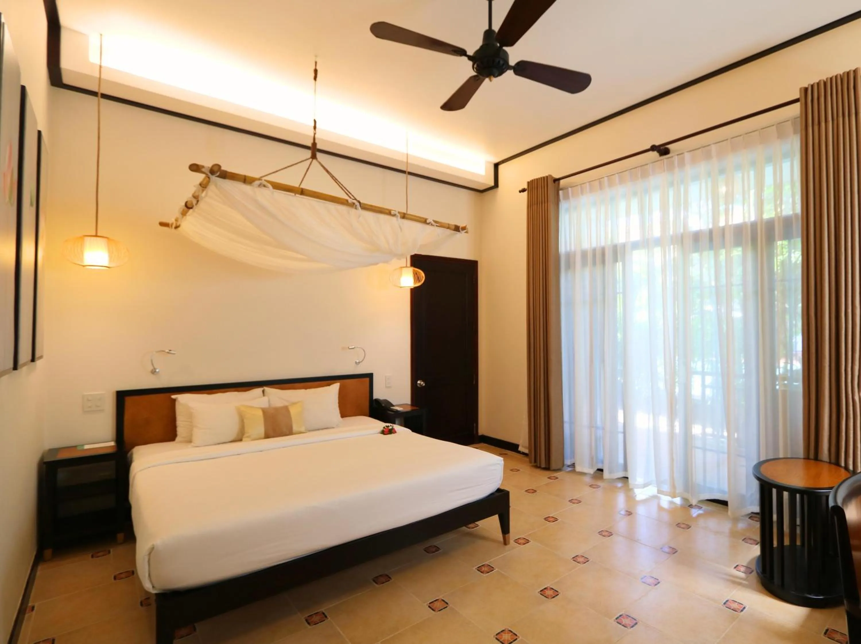 Bedroom, Bed in Bamboo Village Beach Resort & Spa