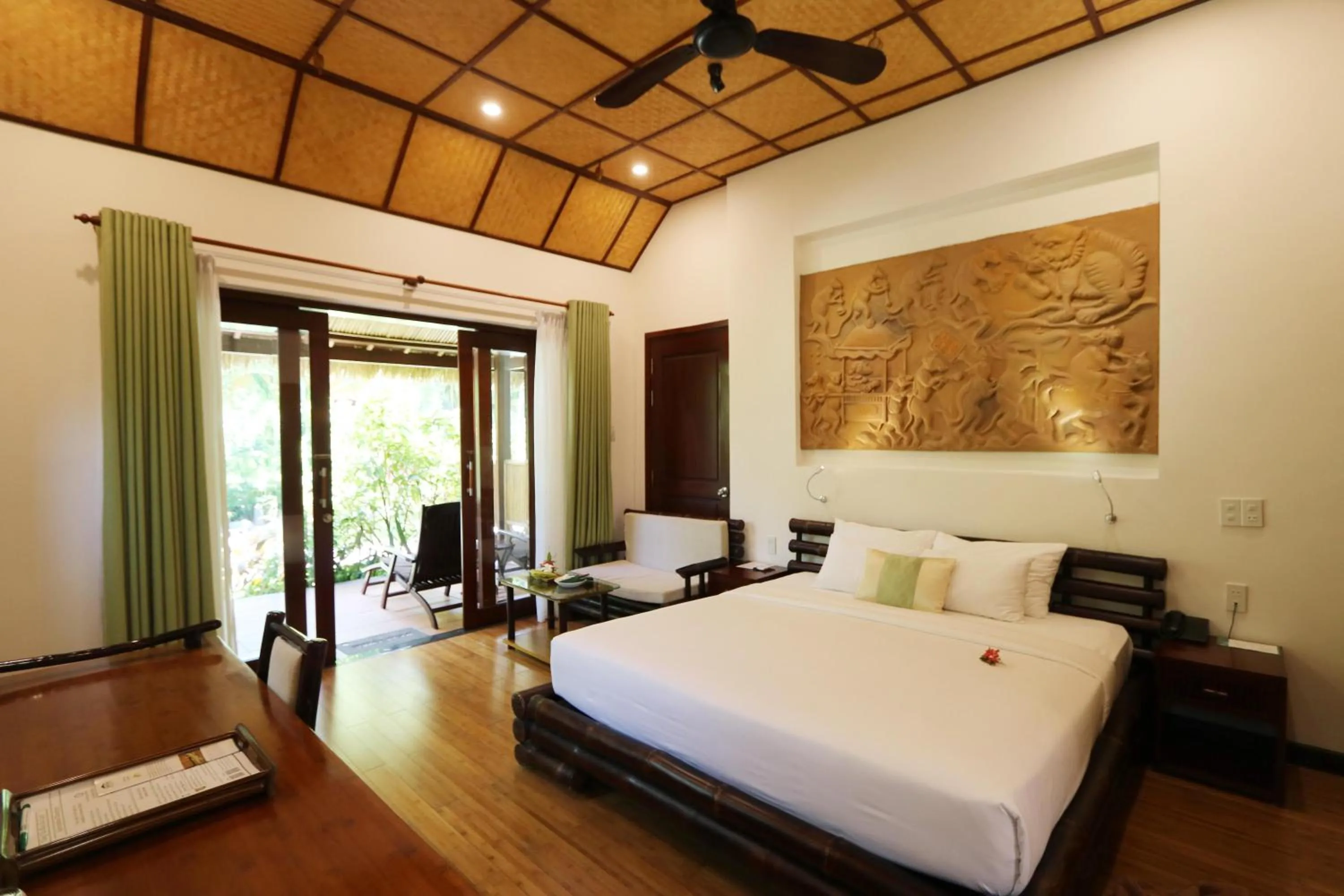 Bedroom, Bed in Bamboo Village Beach Resort & Spa