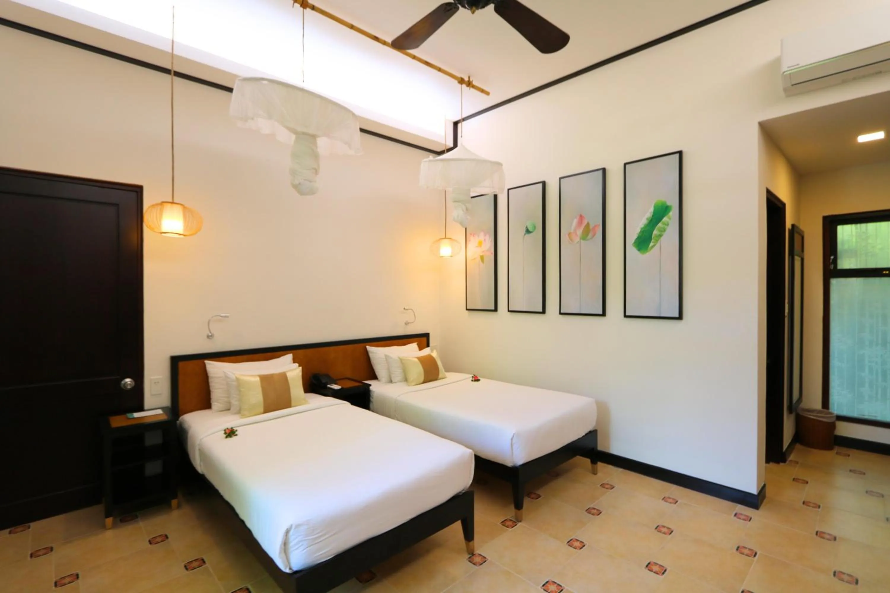 Bedroom, Bed in Bamboo Village Beach Resort & Spa