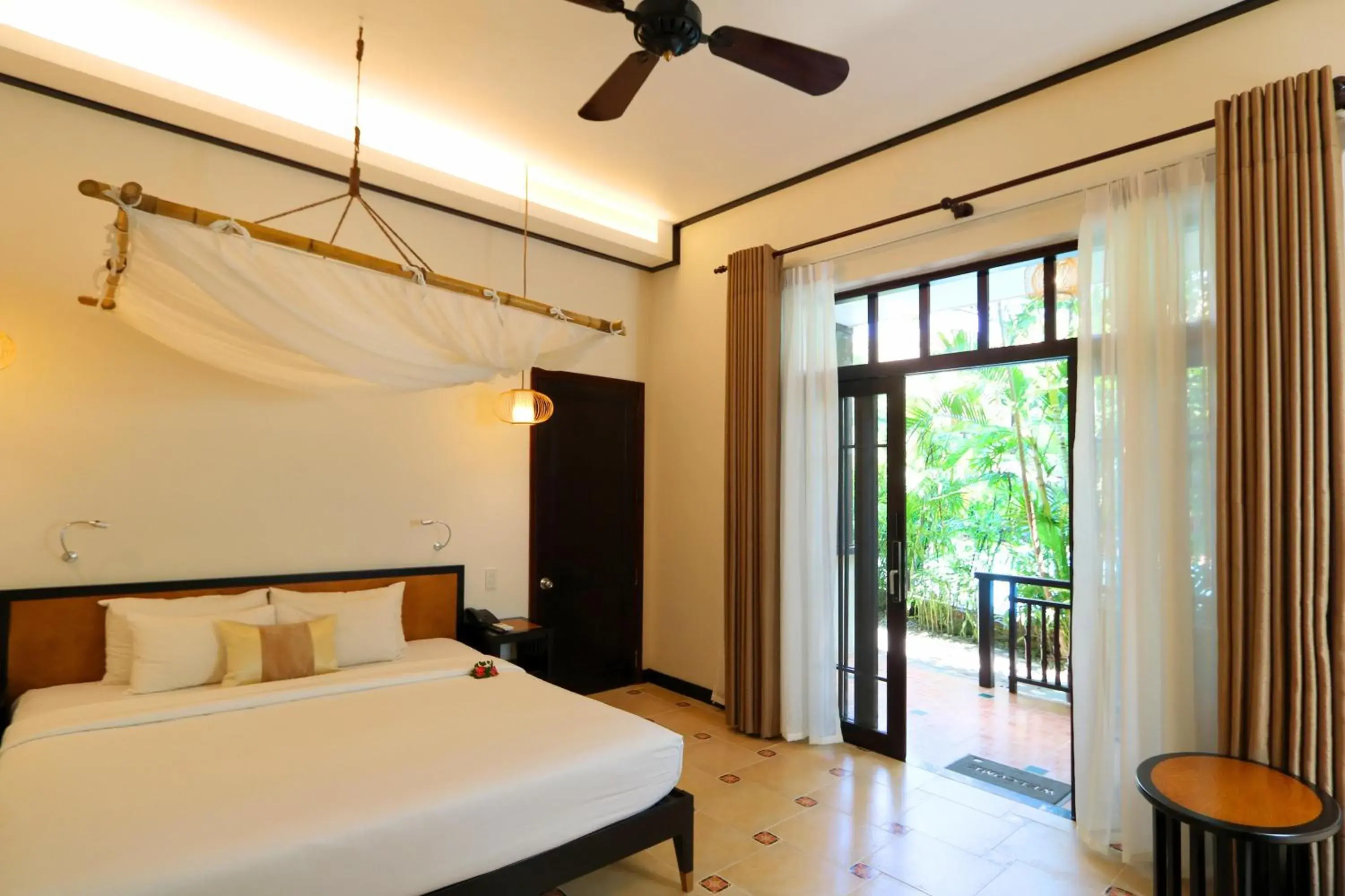 Bedroom, Bed in Bamboo Village Beach Resort & Spa Bedroom, Bed in Bamboo Village Beach Resort & Spa