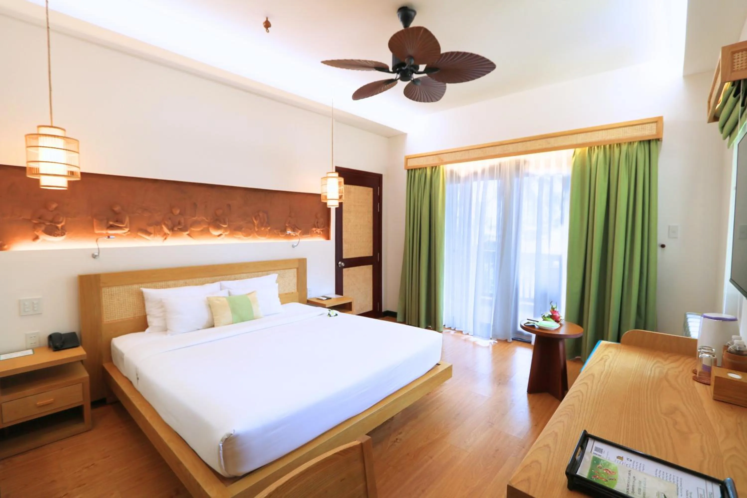 Bed in Bamboo Village Beach Resort & Spa