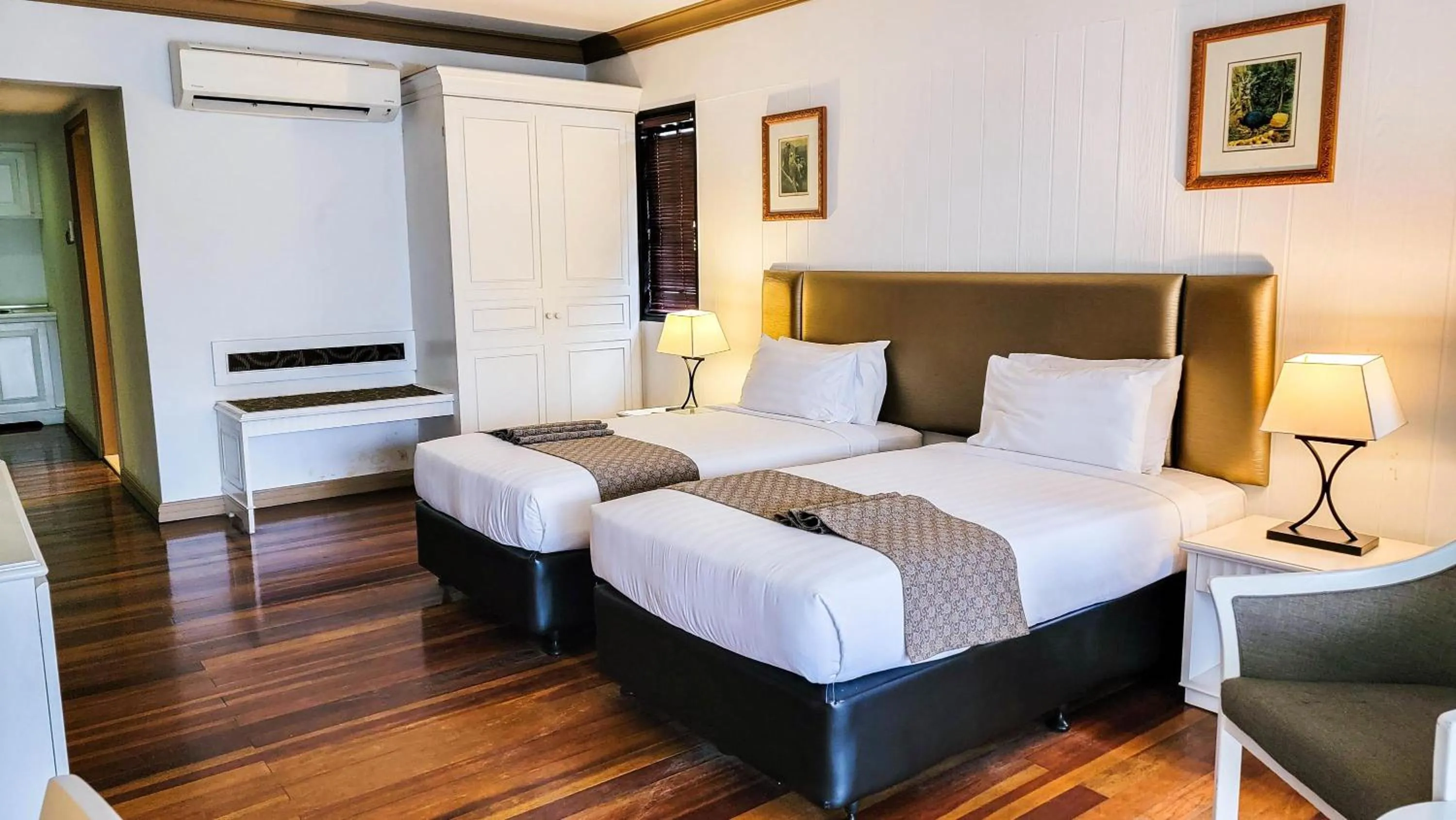 Bed in Mines Beach Resort Hotel