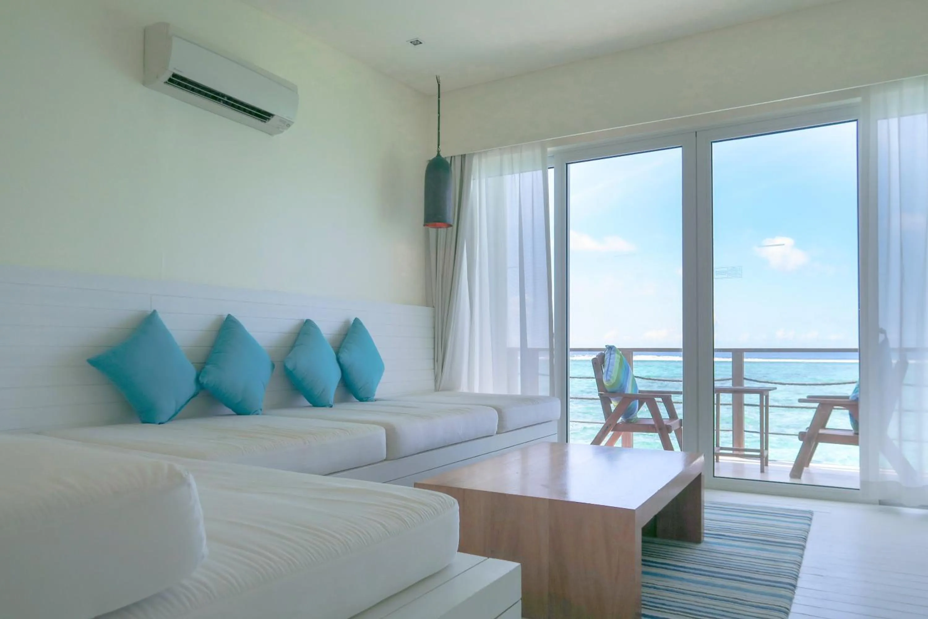 Photo of the whole room, Bed in Holiday Inn Resort Kandooma Maldives - Kids Stay & Eat Free and Free Roundtrip Speed Boat for a minimum 4 nights stay
