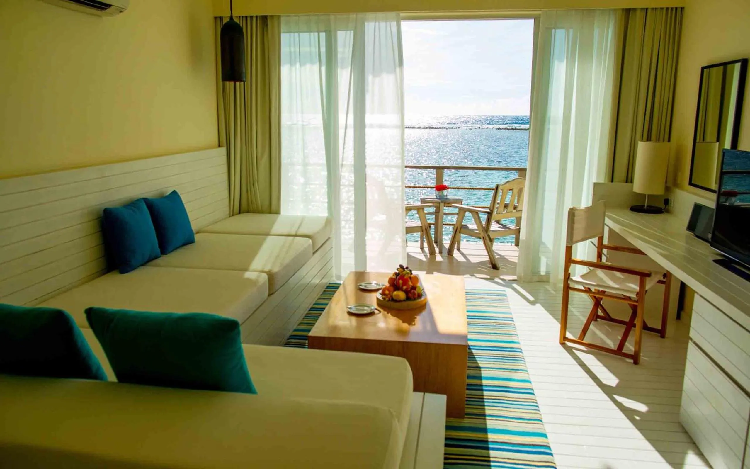 Seating area in Holiday Inn Resort Kandooma Maldives - Kids Stay & Eat Free and Free Roundtrip Speed Boat for a minimum 4 nights stay