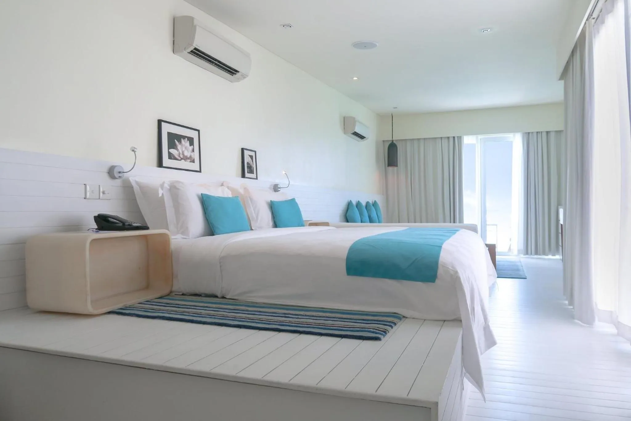 Photo of the whole room, Bed in Holiday Inn Resort Kandooma Maldives - Kids Stay & Eat Free and Free Roundtrip Speed Boat for a minimum 4 nights stay