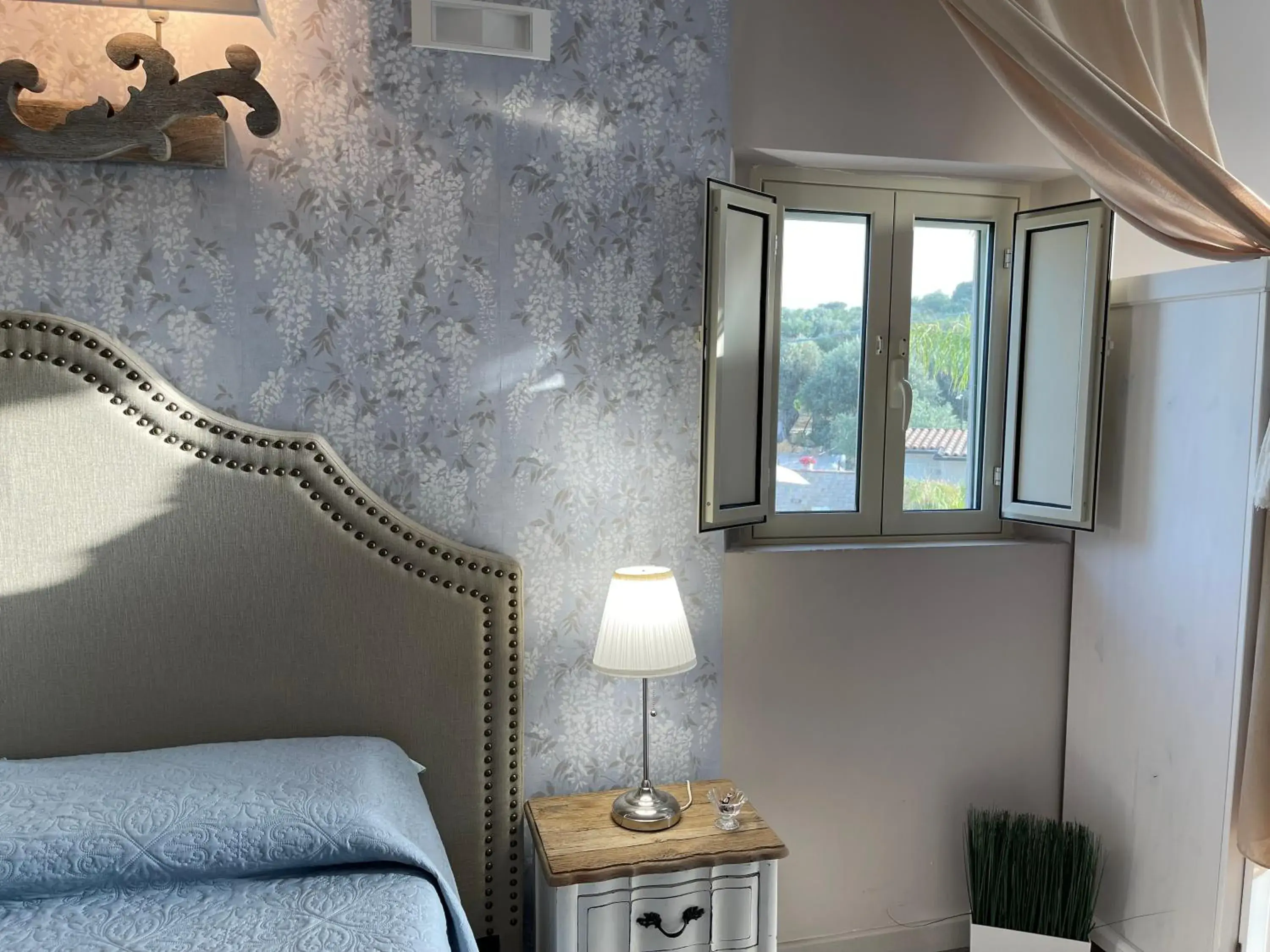 Quadruple Room with Terrace - single occupancy in Relais Dea Degli Ulivi Quadruple Room with Terrace - single occupancy in Relais Dea Degli Ulivi
