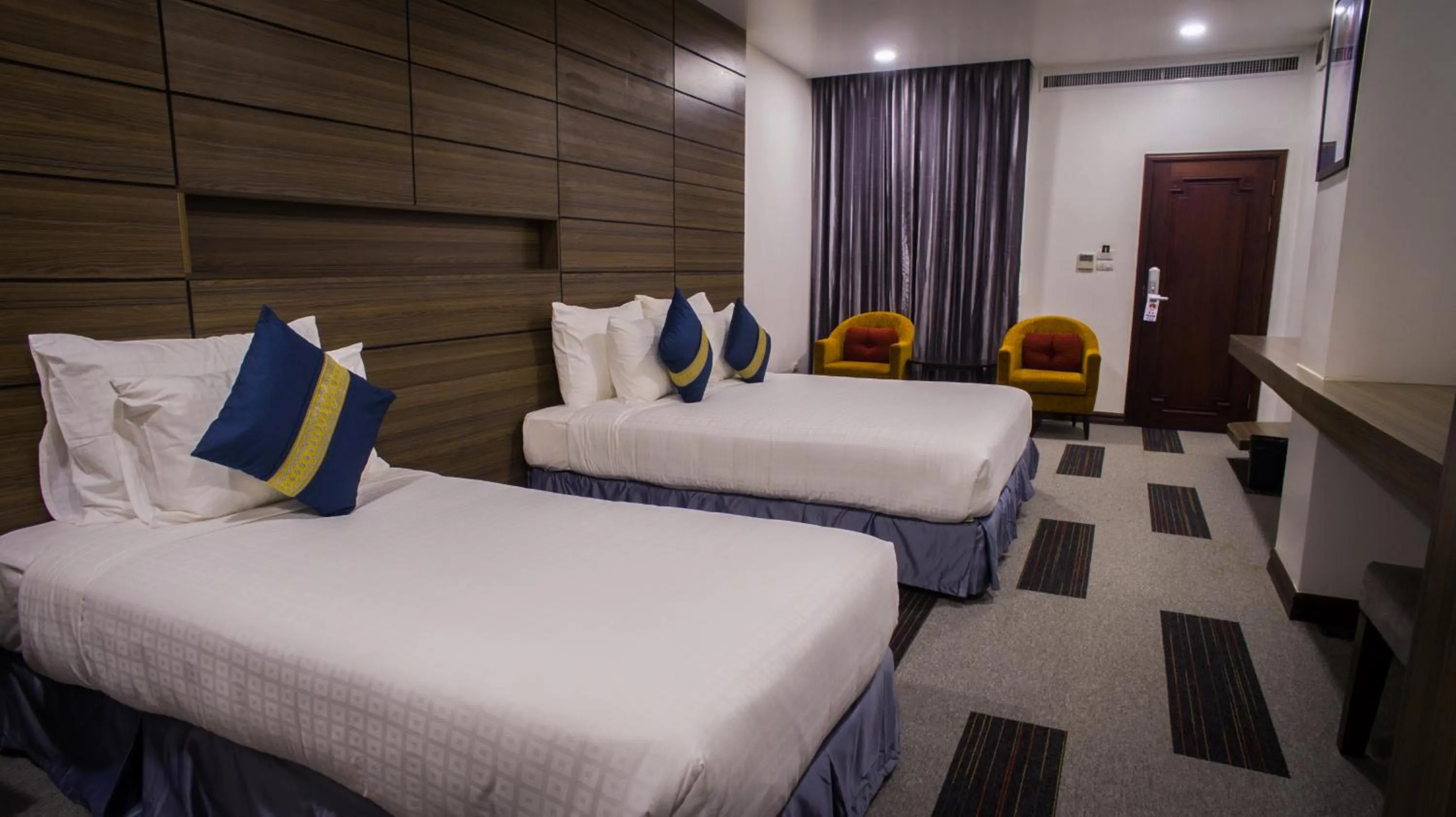 Bed in Family Boutique Hotel