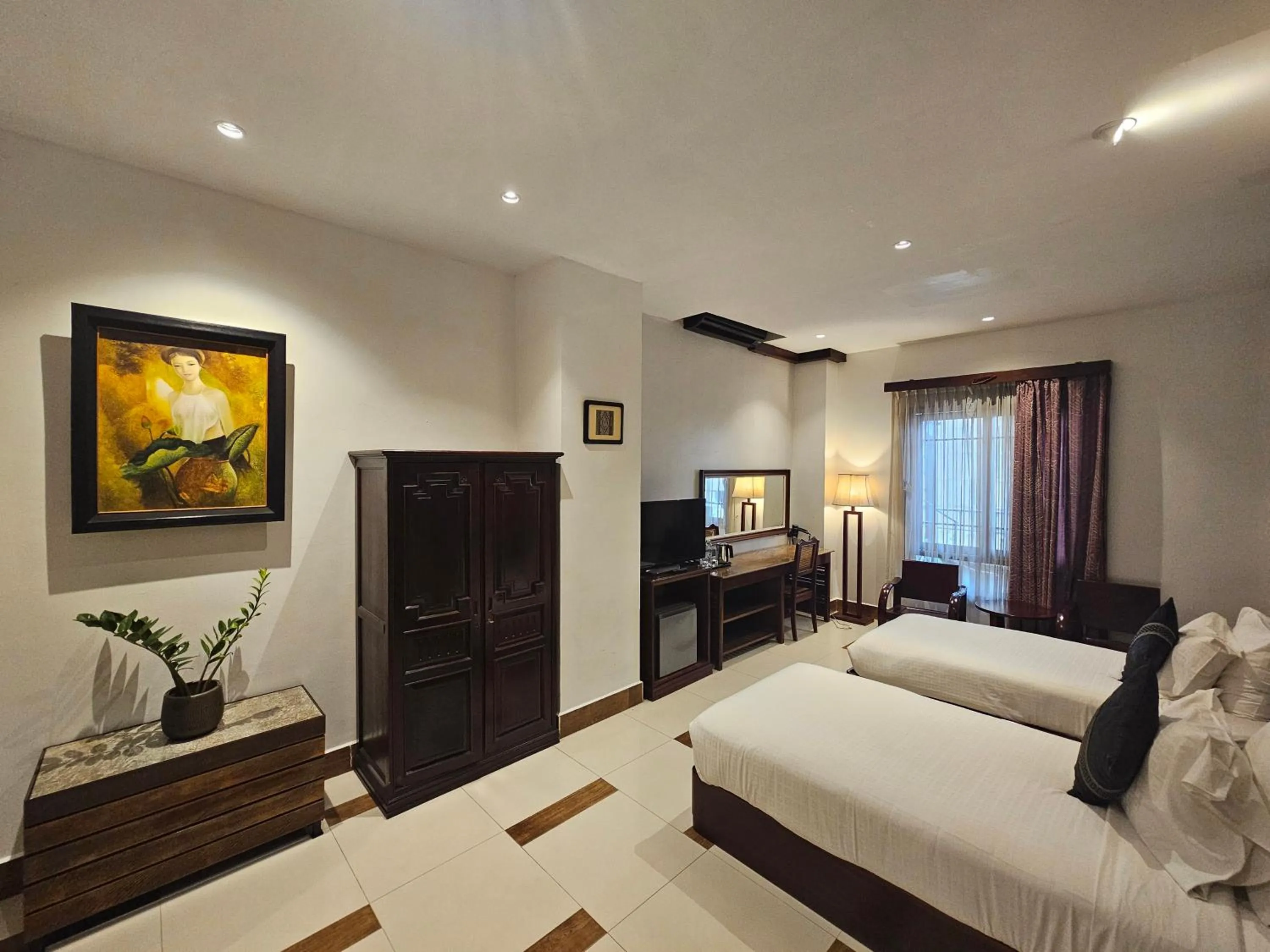 Bed in Family Boutique Hotel