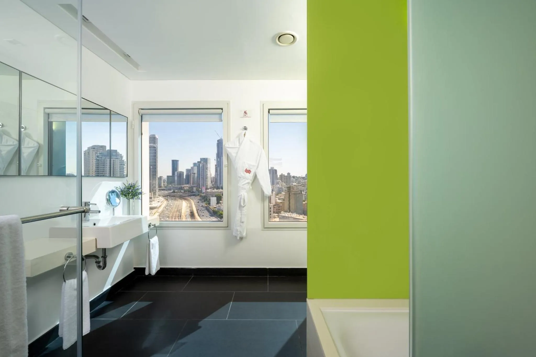 Bathroom, Bed in Crowne Plaza Tel Aviv City Center by IHG