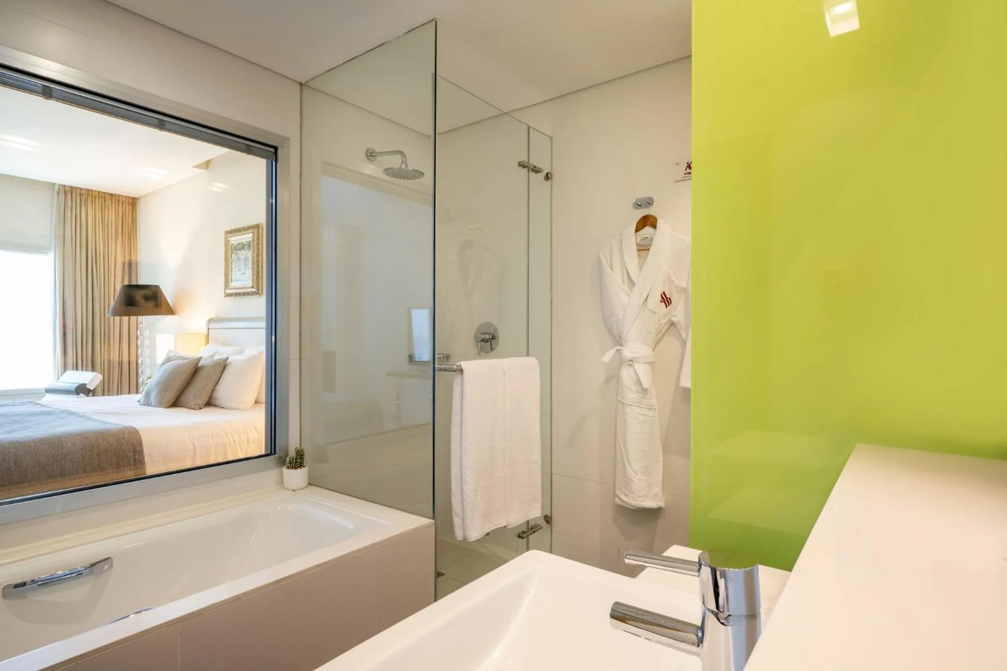 Bathroom, Bed in Crowne Plaza Tel Aviv City Center by IHG