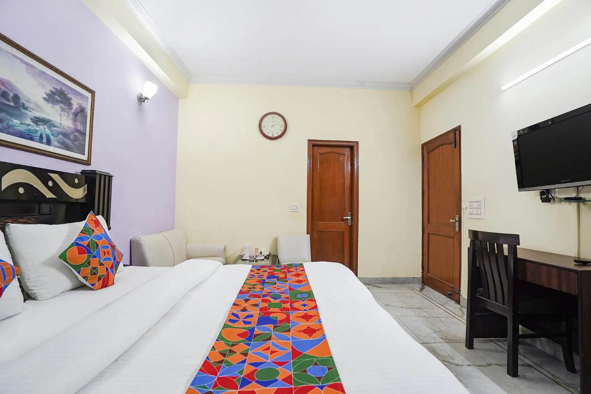 Bed in FabHotel Ivy Inn Sector 35